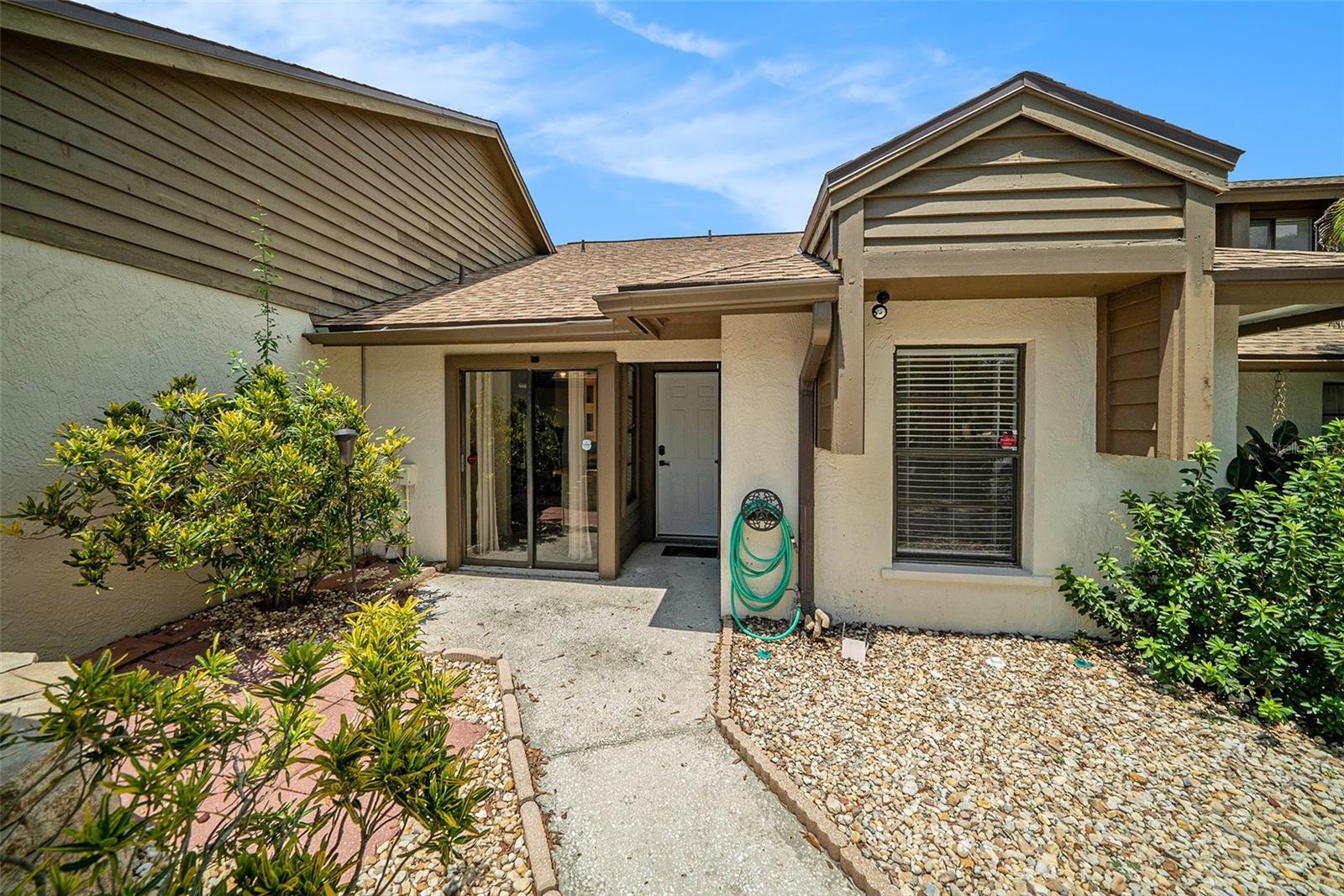 One-Story Villa in Safety Harbor – Short Stroll Away from Philippe Park! This beautifully upgraded villa in Safety Harbor combines modern living with the beauty of nature, offering the best of both worlds. Upon entering, you'll
immediately notice the open floor plan with new flooring installed in 2024. The kitchen boasts elegant dark cabinets
with soft-close features, quartz countertops, stainless steel appliances, and sliders out to your patio area. The spacious
primary suite is a true retreat with a stylish bathroom and a walk-in closet, while the screened patio offers a perfect
space to unwind, overlooking a fenced-in yard ideal for your furry friends! This villa also has a 1 car garage with extra
storage, But what truly sets this home apart is its access to Philippe Park, a gorgeous, expansive green space with
scenic trails and endless outdoor activities. Whether you're into hiking, biking, or simply enjoying the peaceful
surroundings, this park is your backyard! The community itself adds to the charm, with a pool, outdoor grilling area for
entertaining, and tennis courts. Not to mention, you’ll be in the heart of Safety Harbor, known for its lively festivals,
delicious restaurants, and vibrant 3rd Friday celebrations. The proximity to the beach, airports, and all the attractions of
the Tampa Bay area makes this location absolutely unbeatable. Upates also include a new roof on the main house in
2020, new flat roof in 2024, refrigerator 2025 with a 5 year warranty, and new vinyl fencing 2024.  Buyer cancelled due to personal reasons. No Inspections have been done.