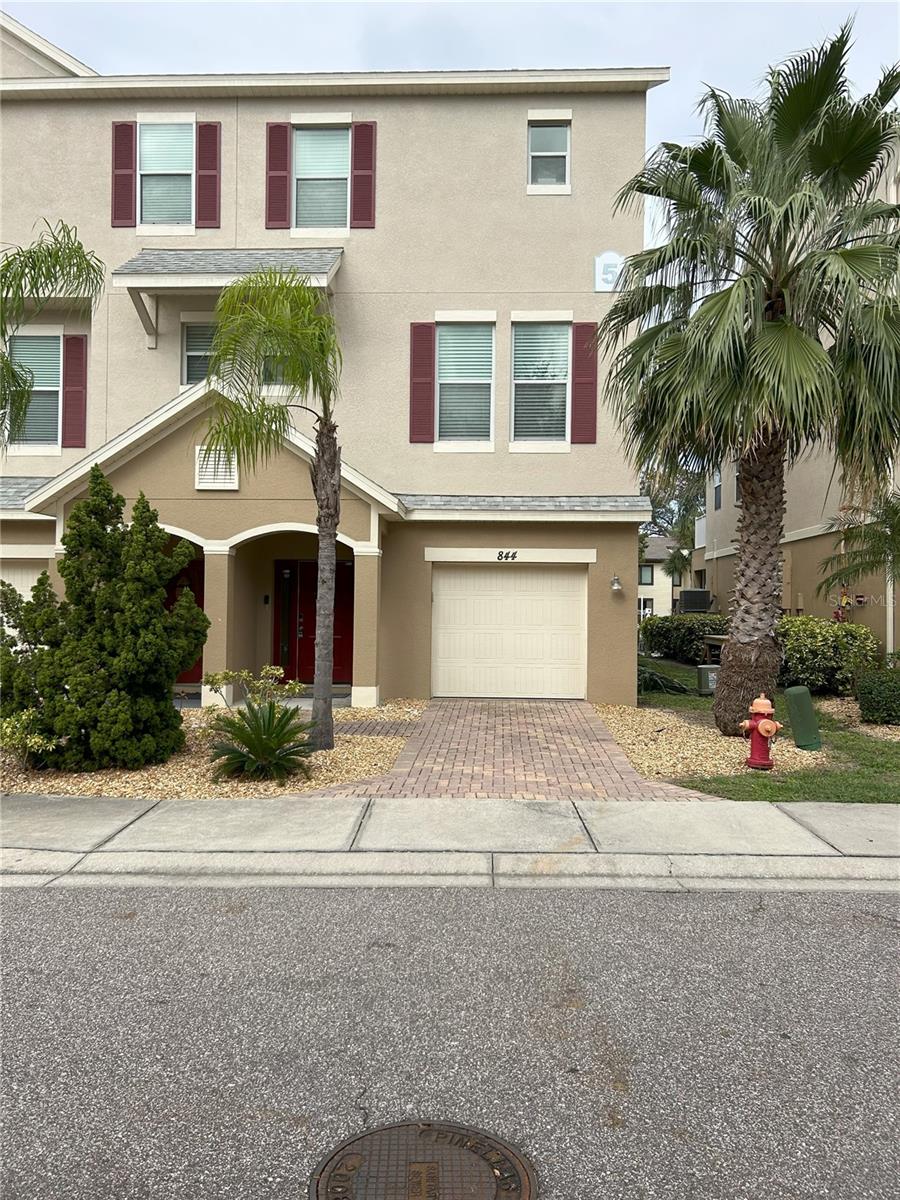 Beautiful 3 bedroom, 2.5 bath townhouse features a deeded boat slip right off the ground floor patio and permitted for boat lift. Affordable luxury with open access to the Gulf of Mexico. This Townhouse is being sold tastefully furnished. All Stainless steel appliances, breakfast bar, built in desk, large island and much more! All new wood plank throughout the entire home. NO CARPETING! With two car garage there is plenty of space for both automobiles and storage. Over sized patio on ground floor and over sized balcony on the second floor over looking boat slip and canal. This home is not only close to major Tampa Bay attractions it is only a short drive to several beaches.