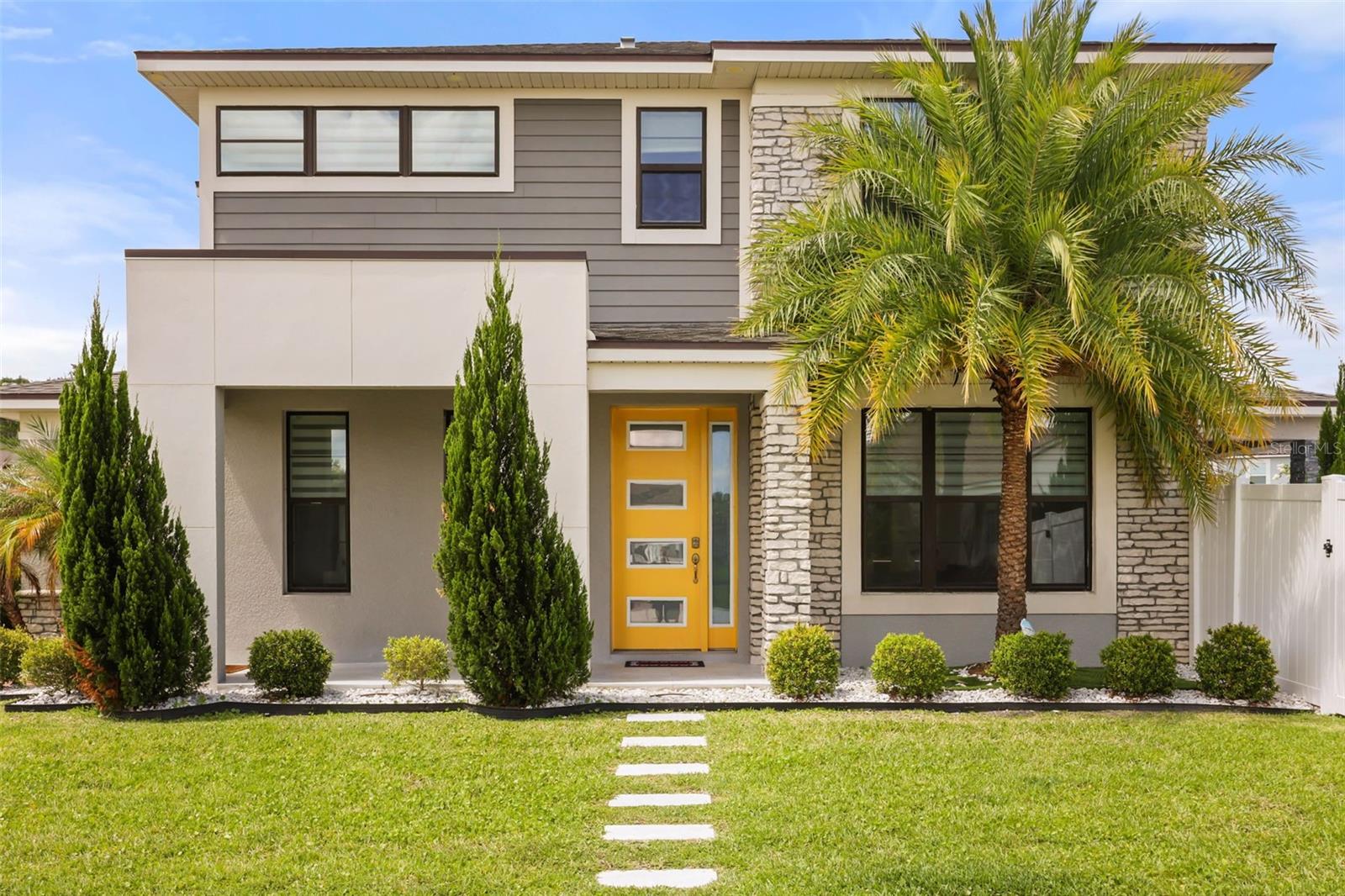 Welcome to 2518 Empress Drive, a fully upgraded, luxury-inspired residence located within the highly desirable gated community of Tapestry in Kissimmee. Built in 2020 and extensively enhanced with high-end finishes and custom outdoor living upgrades, this exceptional 4-bedroom, 2.5-bath home delivers the lifestyle, design, and presentation typically associated with significantly higher-priced properties.

Positioned on a premium corner lot, the home immediately impresses with its modern elevation, expansive paver driveway, and oversized 3-car garage. Inside, the open-concept layout showcases elevated contemporary finishes, oversized tile flooring, upgraded lighting, designer accent walls, and expansive living spaces thoughtfully designed for both everyday comfort and upscale entertaining.

The true showpiece of the property is the spectacular resort-style backyard, representing approximately $200,000 in custom improvements and curated outdoor enhancements. Designed to rival luxury vacation retreats, the outdoor living experience features a heated saltwater pool with modern architectural lines, premium hardscaping, artificial turf accents, custom lounge areas, covered lanai, pergola, summer kitchen, wood-paneled ceiling detail, integrated entertainment space, and multiple gathering areas designed for seamless indoor-outdoor living year-round.

The gourmet kitchen overlooks the main living and outdoor entertaining areas, creating an ideal setting for hosting guests while maintaining functionality and flow. Upstairs, the spacious primary suite offers a private retreat complete with a beautifully upgraded bathroom and oversized custom walk-in closet. Additional bedrooms provide flexibility for family, guests, office space, or lifestyle needs.

Every detail of this home has been thoughtfully designed to create a polished, move-in-ready experience that blends modern elegance with resort-style comfort.

Residents of Tapestry enjoy access to resort-inspired community amenities including a clubhouse, fitness center, community pool, parks, and recreational areas, all conveniently located near premier shopping, dining, major highways, and Central Florida attractions.

This is a rare opportunity to own a highly upgraded, entertainer-focused home offering luxury presentation, exceptional outdoor living, and turnkey sophistication without the million-dollar price tag.

Schedule your private showing today via Showingtime.