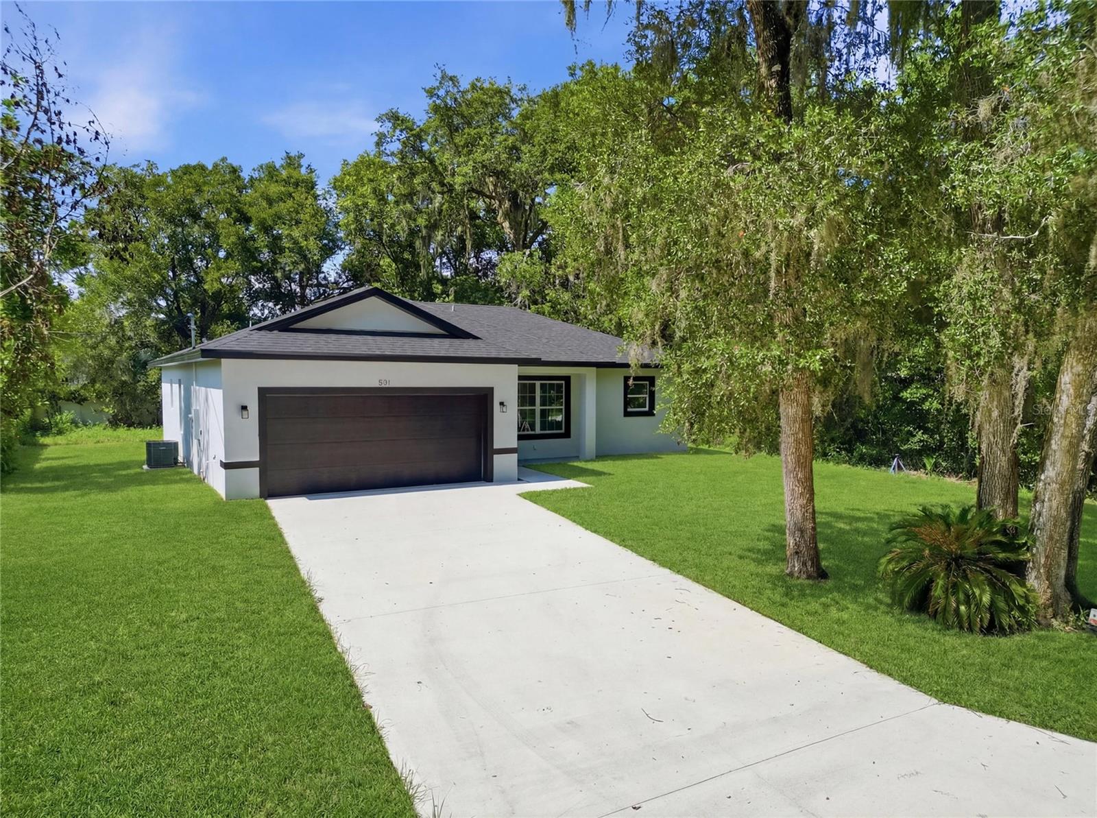 Welcome to this stunning brand-new 2026 construction home, perfectly located only 5 minutes from Blue Springs! This beautifully designed residence offers modern elegance and thoughtful upgrades throughout. Featuring gorgeous ceramic tile flooring, granite countertops, and luxurious designer hanging light fixtures, every detail has been carefully selected to create a modern living space.The open-concept floor plan provides a seamless flow for entertaining and everyday living, while the spacious yard offers endless possibilities for outdoor enjoyment. The home includes 2 full bathrooms and 1 half bathroom, providing comfort and convenience for family and guests alike.Retreat to the spacious primary suite featuring a bathroom with dual sinks, a large walk-in shower, and modern finishes. A standout feature is the spacious 2-car garage, providing ample room for vehicles, tools, and recreational equipment, along with a dedicated storage room for added organization and convenience. Combining style, functionality, and a prime location, this move-in-ready home is an exceptional opportunity you won’t want to miss!