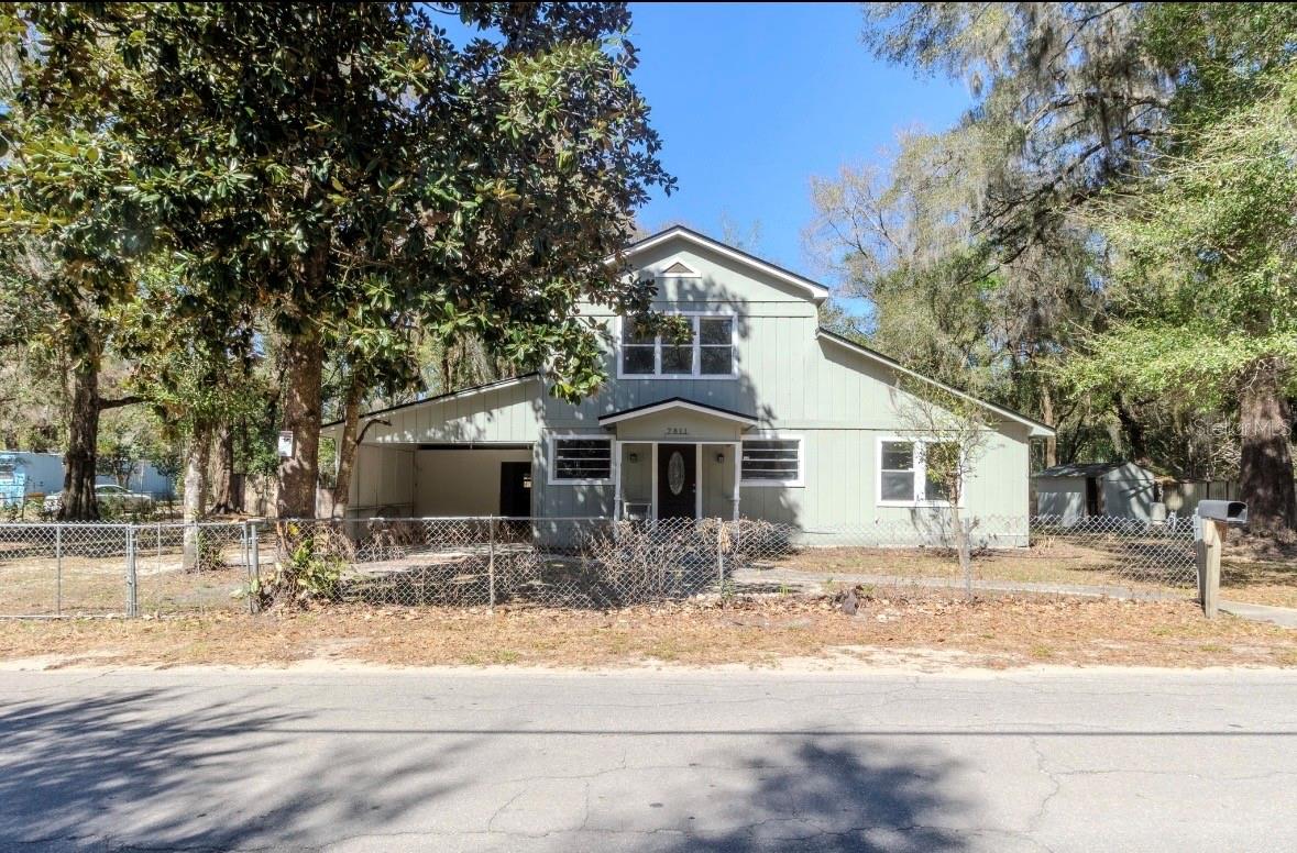 Discover the potential of this 1,925 sq. ft. multi-level residence situated on a prime corner lot in Inverness. Built in 1930, this 3-bedroom (plus bonus room), 2-bath home offers an expansive layout under a 2,495 sq. ft. roofline. The interior features a formal dining room, eat-in kitchen, and a master-on-main split plan that is highly sought after for both rentals and families.

Outdoors, the .2-acre lot is fully fenced and buffered by an adjacent county parcel, ensuring a quiet retreat. Recent updates include a new well pump and durable luxury vinyl tile flooring in key areas. Located in a "car-optional" sweet spot, you are minutes away from Citrus Memorial Hospital, downtown festivals, and the public boat ramps to the Chain of Lakes. Whether you’re looking to finish a historic restoration or secure a high-demand rental property in a growing market, 7811 E Watson is a must-see. Property is being sold AS-IS—don’t miss out on this piece of Inverness history!
