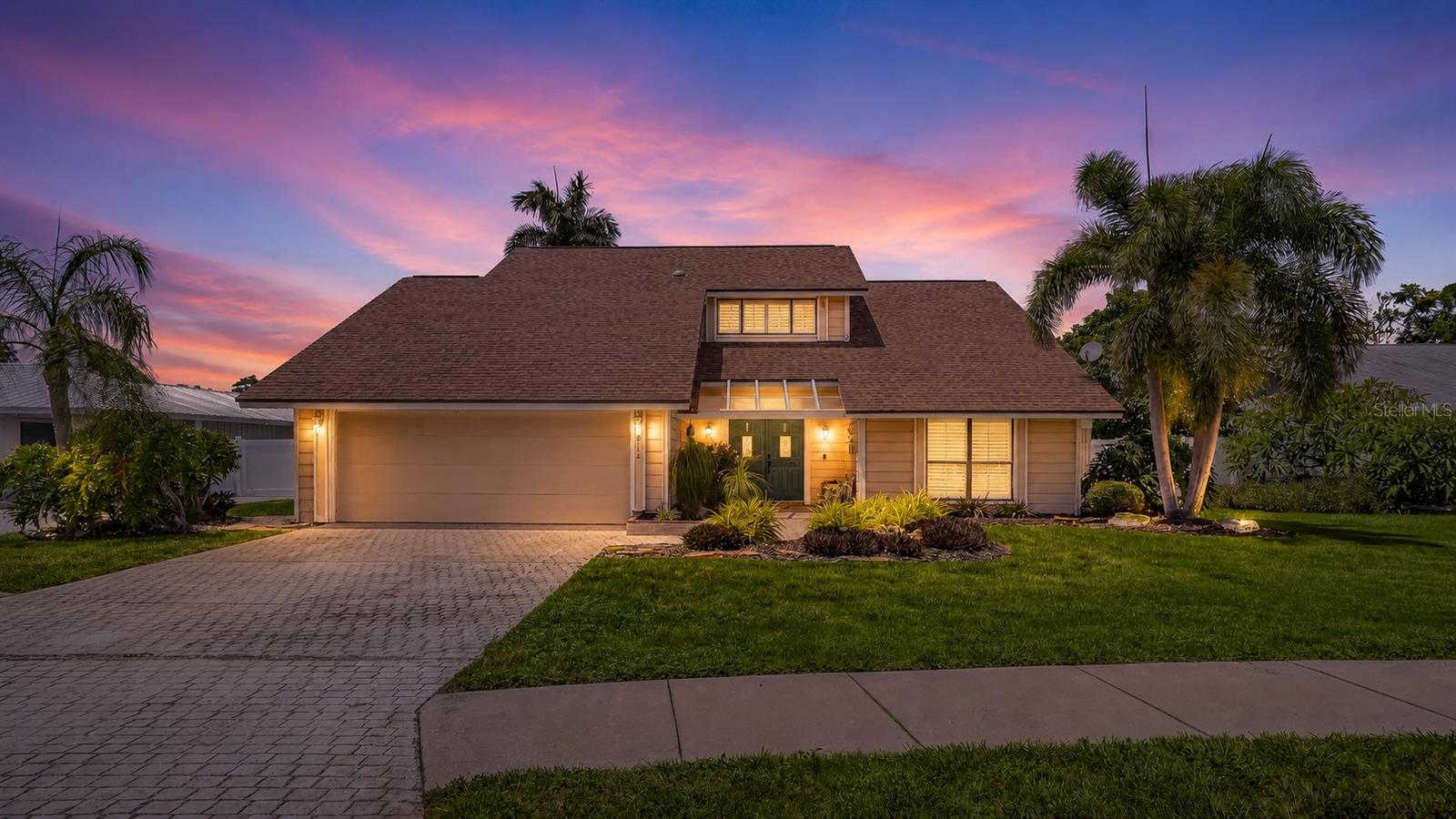 Northwest Bradenton Pool Home – Embrace the Florida Lifestyle!  Discover the perfect blend of comfort, style, and location in this beautifully updated 4-bedroom, 3-bathroom home in highly sought-after NW Bradenton. Designed for relaxed Florida living, this exceptional residence features vaulted ceilings, abundant natural light from skylights, gorgeous new flooring throughout, plantation shutters, and an updated kitchen complete with all-new appliances. As an added bonus, all 3 bathrooms have been updated. The spacious floor plan is enhanced by two A/C systems, providing year-round comfort, while the attached 2-car garage offers ample storage for vehicles, golf carts, beach gear, and more. Step outside and enjoy your private backyard oasis. The newly refurbished sparkling swimming pool is the centerpiece of the outdoor living space, complemented by a covered lanai—the perfect place to enjoy your morning coffee, unwind with an afternoon beverage, or entertain family and friends in true Florida style. The large fenced yard provides plenty of space for pets, play, and outdoor enjoyment. Location is everything, and this home delivers. Just minutes from the world-renowned beaches of Anna Maria Island, you'll also enjoy easy access to Robinson Preserve, where miles of hiking and biking trails, scenic boardwalks, kayaking, and wildlife viewing create endless opportunities for outdoor recreation. Historic De Soto National Memorial is nearby, offering breathtaking waterfront views and rich local history. Families will appreciate the convenient walkway access to nearby elementary school and the middle schools that is close by, while sports enthusiasts will love being close to IMG Academy and numerous golf courses. Frequent travelers will enjoy the easy drive to both Sarasota-Bradenton International Airport (SRQ) and Tampa International Airport (TPA). Whether you're looking for a primary residence, vacation retreat, or family home, this Northwest Bradenton gem offers everything you need to enjoy the very best of Gulf Coast living. Experience the best of NW Bradenton—where beautiful beaches, outdoor adventure, top-rated amenities, and a relaxed coastal lifestyle are all just minutes from your front door. Live where every day feels like a vacation in one of Bradenton's most sought-after locations.
