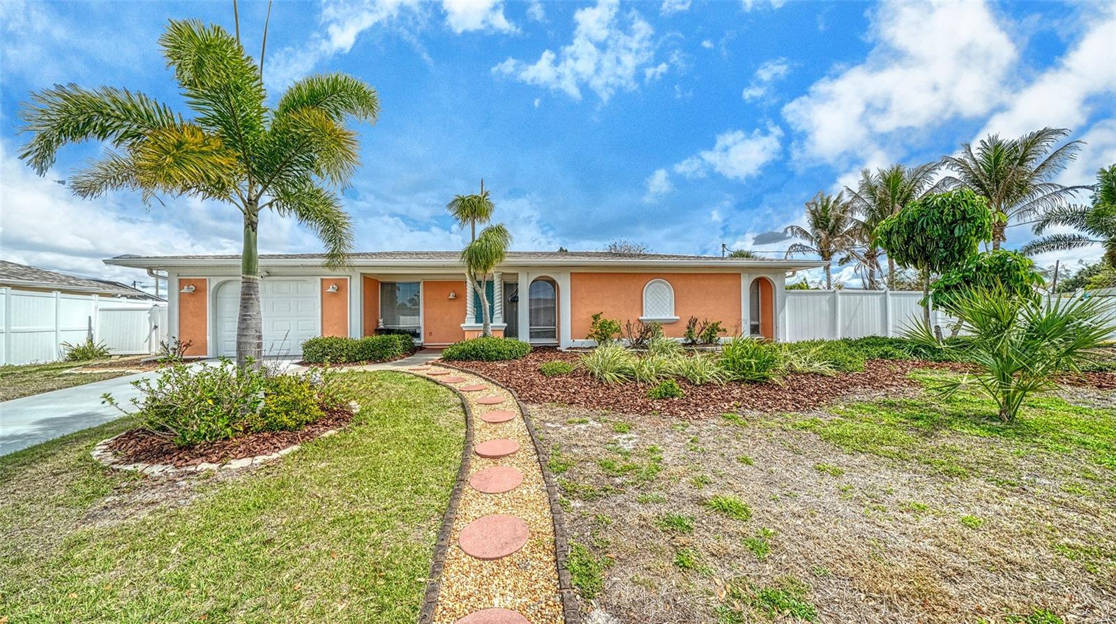 NEW SEPTIC AND DRAINFIELD CONTRACTED: Welcome to your slice of Florida charm in Nokomis—West of the Trail but X FLOOD ZONE! This inviting 3-bedroom, 2-bath single-family home with a 1-car garage offers the perfect blend of coastal lifestyle, convenience, and freedom with no HOA restrictions. Located in a golf-cart-friendly neighborhood, you’ll love being just minutes from Nokomis Beach, the North Jetty, and local favorite Pop’s Sunset Grill—making it easy to enjoy sunset dinners, boating, fishing, and everything the Gulf Coast lifestyle has to offer. Inside, the home features a comfortable layout with plenty of natural light and easy living spaces. The huge family room has so much natural light and beautiful windows showcasing the backyard and sliders onto the lanai. Step outside to paradise and discover one of the property’s true highlights: a huge fenced backyard that feels like your own private garden oasis. Lush landscaping, flowers and mature Florida greenery create the perfect setting for relaxing, entertaining, or enjoying Florida’s beautiful weather year-round. There’s also plenty of room to store your boat, RV, golf cart, or other toys, a rare find so close to the water. Major updates provide peace of mind, including a new shingle roof in 2021, a new flat roof in 2022 and 2023 water heater. The home is connected to county water, and a private well is available for future irrigation, helping keep the landscaping green while saving on utility costs. Whether you're looking for a full-time residence, vacation getaway, or investment opportunity, this West of the Trail Nokomis gem puts you close to beaches, waterfront dining, and the laid-back coastal lifestyle everyone loves. Don’t miss this opportunity to own a piece of paradise just minutes from the Gulf! Furniture optional and negotiable making this a truly move in ready home so close to the beach!