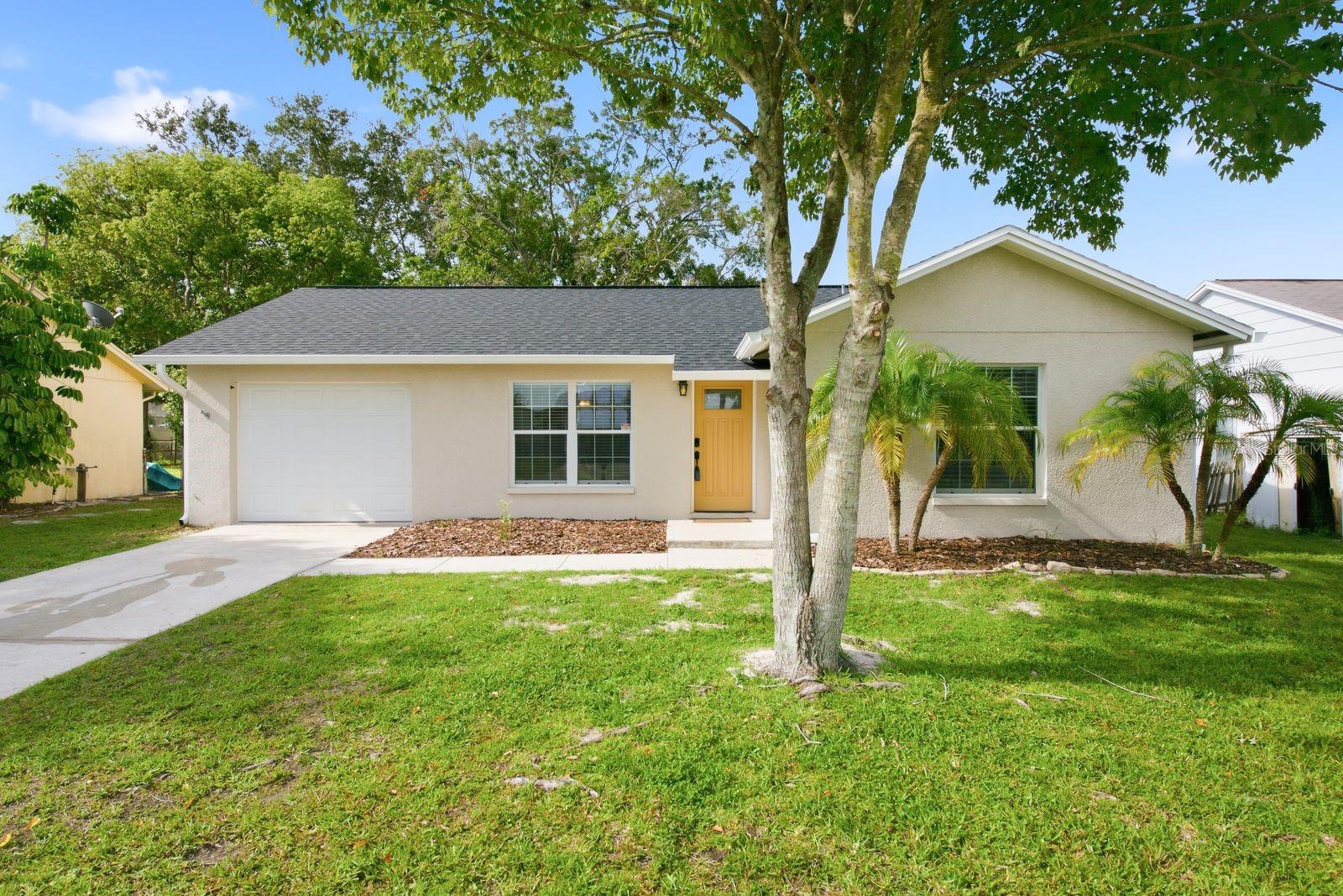 Put this home at the top of your list! FRESHLY PAINTED INTERIOR (including ceilings & garage) BRAND NEW ROOF JUST INSTALLED (5/26) NEW A/C SYSTEM (2025) NEW RAIN GUTTER SYSTEM (6/26) and that is just the beginning! 2 spacious bedrooms, 2 full bathrooms, 1 car garage, open floor plan gives an air of spaciousness! This home is in an A Rated school system, Trinity Oaks elementary, Seven Springs Middle & J.W. Mitchell High school are all excellent schools which makes this a sought-after location along with its proximity to all the shopping, dining, medical facilities, golf that the Trinity area offers. Enter the nice living room with vinyl plank flooring that flows into both bedrooms and the hall. You will love the crown molding, giving a little touch of elegance to the home. The kitchen is perfect and has all stainless-steel appliances, Tile floor, and a window to watch out the back while the little ones or furry friends are playing, also has a nice casual dining area and a sliding door out to the backyard. The primary bedroom is light & bright, has crown molding, a large closet and en-suite full bathroom giving complete privacy to the owners. The second/guest bedroom is also spacious with ample closet space; it also has crown molding and is conveniently next to the other full bathroom with tub & shower and is very nicely updated. There’s also a very handy, large closet in the hall. Attached 1 car garage with automatic door opener, washer & dryer (stay with the home) offers lots more storage options. The completely fenced backyard is very large and has a generously sized wood deck, perfect for entertaining, playing or your furry friends. Located close to major roads making it easy to get anywhere in the area, and of course world class beaches! Make an appointment to see this awesome home today and avoid the disappointment of missing out!