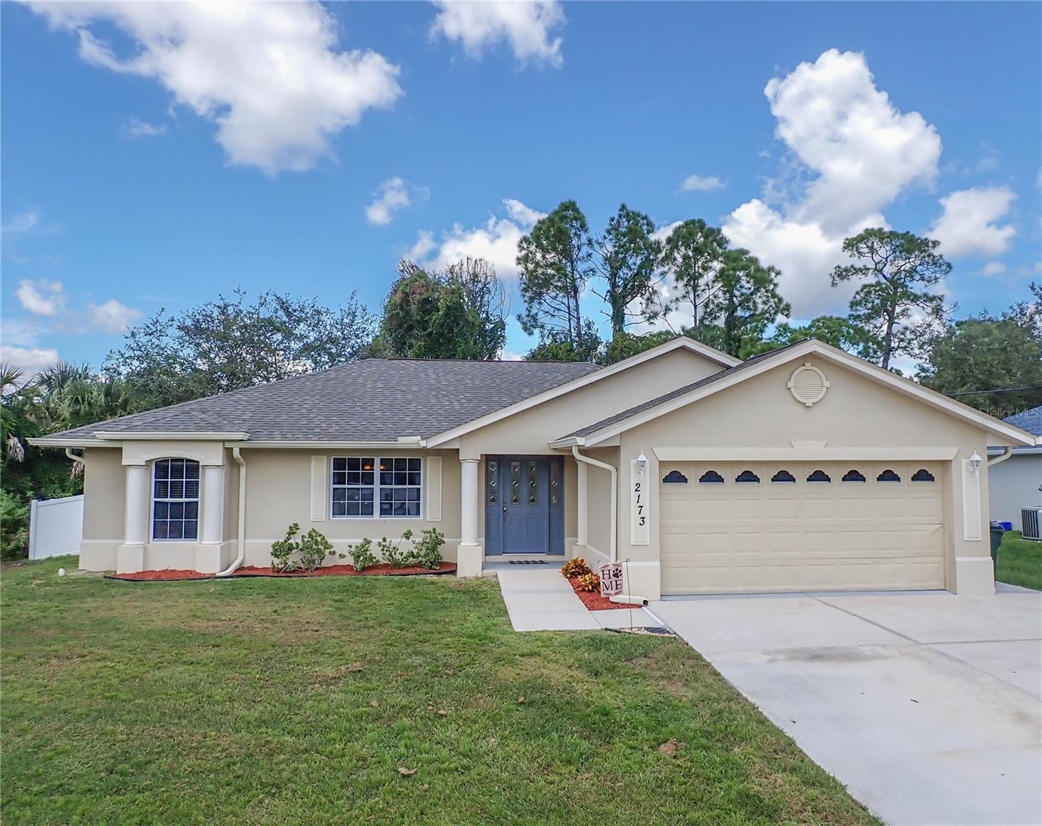 PRICE IMPROVEMENT! PLEASE SEE THE 3D VIRTUAL TOUR! Charming Home with an Ideal Location near Cranberry Elementary School in North Port! Welcome to this delightful home built in 2006, offering a comfortable and contemporary living experience. Situated in a desirable neighborhood this property presents an excellent opportunity for families seeking a convenient location and a move-in ready home. This home has over 1400sq/ft of living space with 3 bedroom, 2 baths and a 2 car garage. The roof was replaced in 2023 ensuring long-term durability. The interior of this home boasts a well-designed floor plan, maximizing space and functionality. Natural light floods the home, creating a warm and inviting ambiance. The property features three comfortable bedrooms, providing ample space for relaxation and privacy. The master bedroom includes an en-suite bathroom, offering convenience and comfort. The two additional bedrooms are ideal for children, guests, or a home office setup. The two bathrooms are well-appointed, catering to the needs of the household. Brand new AC unit installed in 2021, providing efficient climate control. Convenient inside laundry room with washer and dryer included. The property is conveniently situated in an area with city water, ensuring ease and reliability. The fenced backyard offers a secure space for children to play and pets to roam freely. The screened lanai provides an ideal spot for entertaining guests or enjoying the outdoors while staying protected from the elements. Close proximity to schools, parks, shopping centers, and other amenities, with easy access to major transportation routes, making commuting a breeze. Don't miss this opportunity to own a beautiful home with convenient location. Schedule your showing today and envision your family's future in this wonderful property!