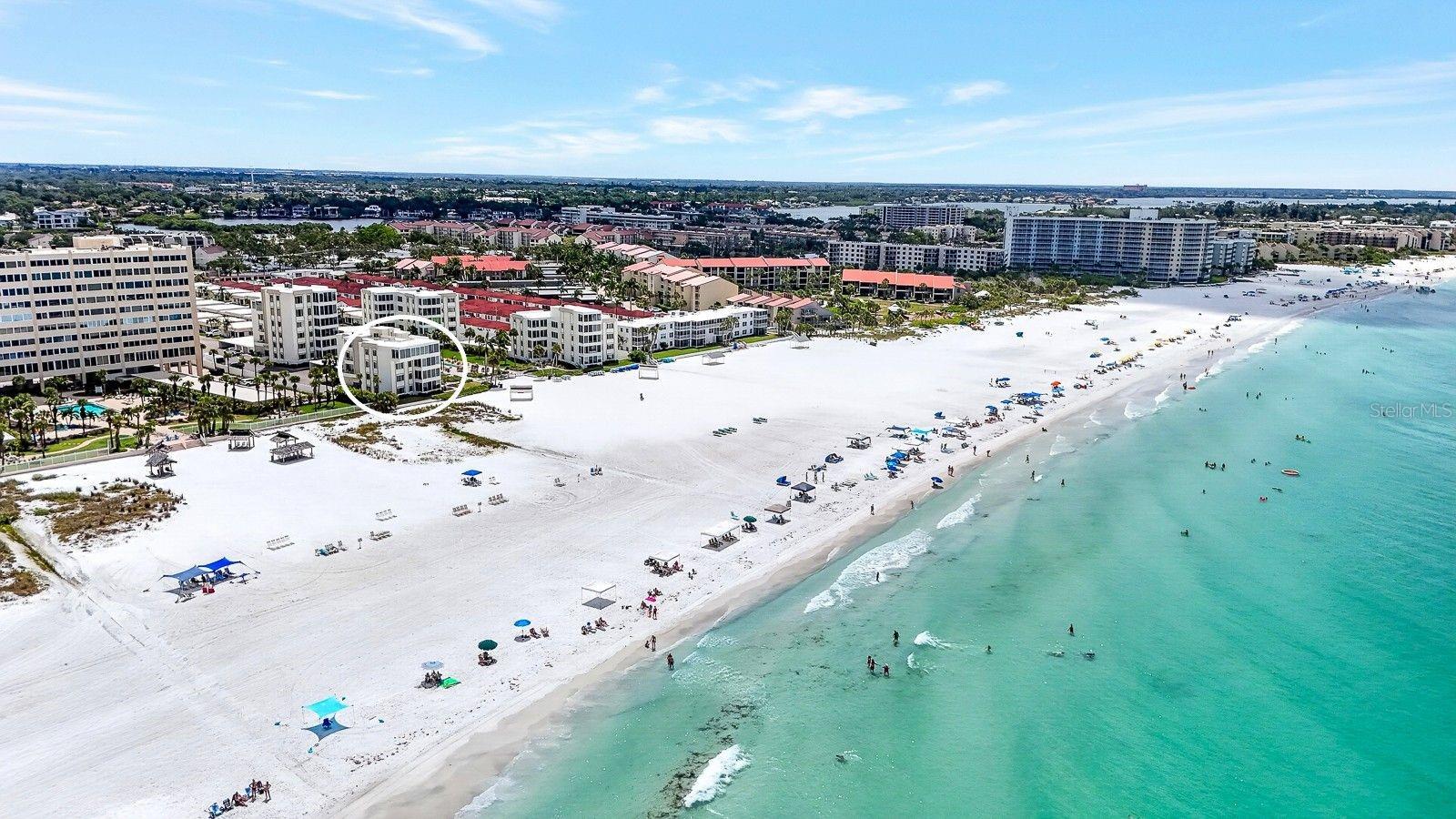 Island House Dream Condo on Siesta Key!

Experience the best of beachfront living at Island House on world-famous Siesta Key, where breathtaking Gulf views, unbeatable location, and effortless island living come together. Perfectly positioned in one of the most desirable beachfront buildings in the community, this second-floor condo offers truly unobstructed beach and water views with no other condo or building standing in your way.

From the moment you arrive, the view takes center stage. Enjoy stunning beach views from all living areas, including the living room, guest bedroom, and master bedroom. New hurricane-impact windows and expansive glass bring the beauty of Siesta Key inside, creating a bright, open, coastal retreat from every angle.

This is as close to the sand as it gets—literally beachfront and just steps from the world-famous powdery sand and warm Gulf waters. The elevated second-floor setting gives you the privacy and peace of mind you want, with no past water intrusion or storm damage to the unit, while still offering easy access to the beach and a convenient ramp for luggage.

Inside, the condo is move-in ready and designed for easy beach living, featuring tile flooring throughout, an updated kitchen with solid-surface/granite counters, and beautifully updated bathrooms with elegant tiled showers. Whether you are looking for your own Siesta Key escape or an income-producing investment, the flexible 3-night minimum rental policy makes this an outstanding opportunity.

Island House offers everything you need for the perfect beach lifestyle, including on-site management, refreshed landscaping, outdoor dining and game areas, beach chairs, chaise lounges, shaded beach cabanas, shuffleboard, cornhole, a heated community pool, and a clubhouse with billiards, foosball, board games, and puzzles.

When you are ready to explore, hop on the free trolley or local ride-share vans to Siesta Key Village for shopping, dining, and nightlife, or venture to Turtle Beach, downtown Sarasota, restaurants, boating, fishing charters, performing arts, museums, parks, and the Legacy Trail.

This is more than a condo—it is your front-row seat to Siesta Key’s legendary beach lifestyle. Bring your toothbrush, swimsuit, and love for sunsets, because this one is ready to enjoy!