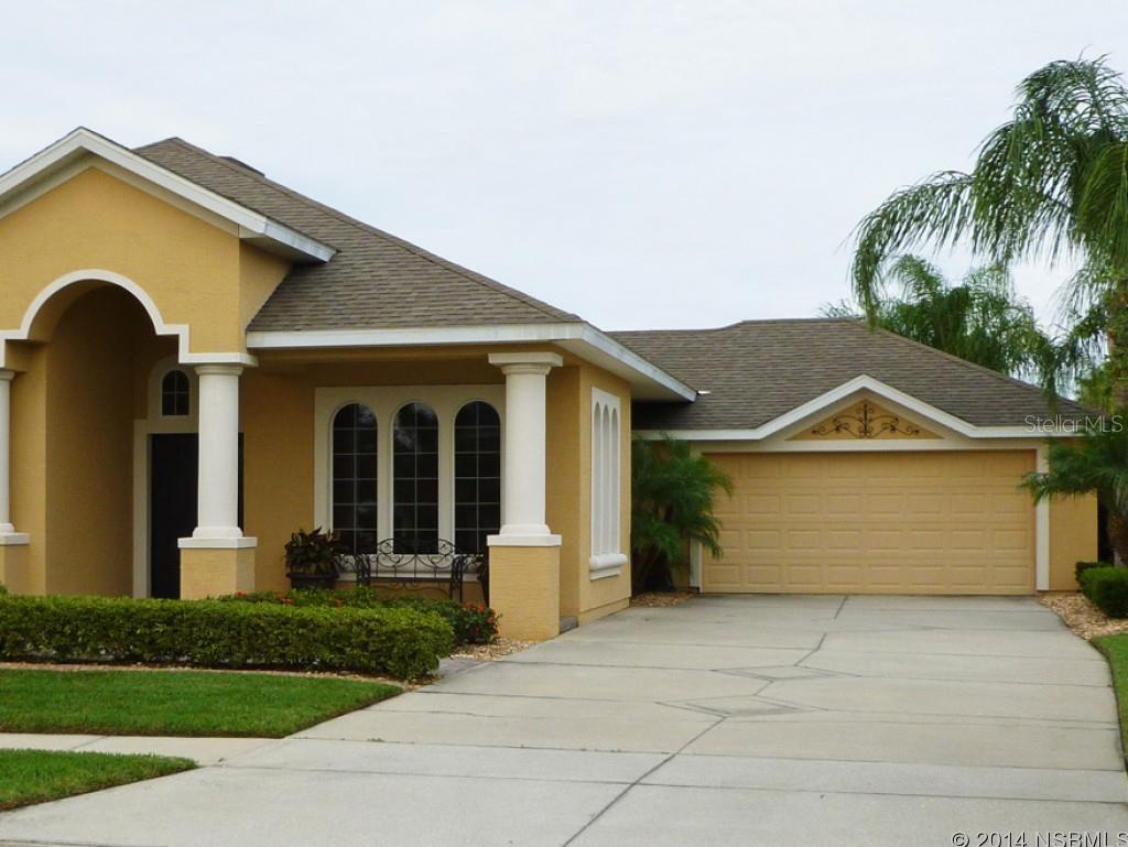 Excellently maintained 3 Bedroom 2 Bath home in Venetian Bay Town and Country Club. Freshly Painted interior. Spacious, open floor plan, that leads outside through 8' sliders to large paver patio with tile and stucco bar and barbeque. Pool size yard with white vinyl fencing for back yard privacy. EXTRA LARGE 2 CAR GARAGE! Extra large corner lot. Inside features a beautiful extra large master suite with sitting room with columns. Master on-suite bathroom includes double sinks, walk-in closet, walk-in shower and garden tub. 10' ceilings throughout with 6 1/2" crown moulding. Recessed lighting in Kitchen, Great Room, Dining Room/Office and bathroom areas. Spacious inside laundry room filled with cabinets and clothes hanging area. Extra large 2 car garage widened by 2 feet and extended in back 10 feet with extra garage door leading to back yard for easy access. All this within walking distance to Venetian Bay downtown shops, restaurants, golf and beach club. Short ride to the Port Orange Pavilion, Restaurants, grocery stores and the WORLDS FAMOUS BEACHES. ;Water: City