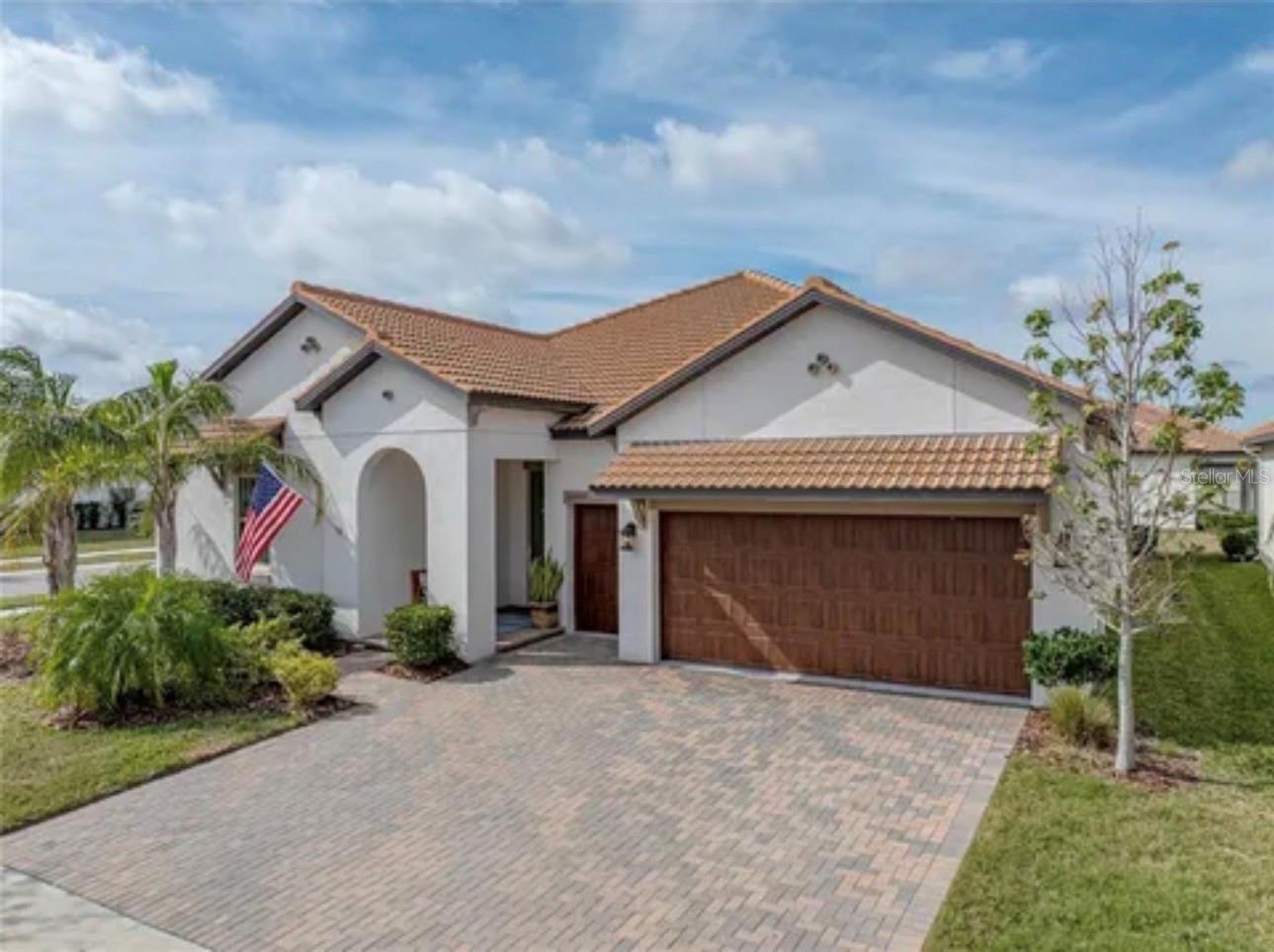 Welcome to 16959 Scuba Crest Street where luxury, thoughtful upgrades, and resort-style living come together in the highly sought-after 55+ Medley at Southshore Bay community.

This beautifully appointed 3-bedroom, 2.5-bath residence offers 2,363 square feet of impeccably maintained living space designed for both everyday comfort and effortless entertaining. From the moment you step inside, you’ll appreciate the exceptional craftsmanship, featuring elegant crown molding, rich Shaw engineered hardwood flooring, and an open-concept design filled with natural light.

The heart of the home is the chef-inspired kitchen, thoughtfully upgraded with premium GE Profile appliances, including a 36-inch five-burner induction cooktop and a convection wall oven/microwave combination, creating the perfect space to prepare everything from casual meals to holiday gatherings.

Retreat to the spacious owner’s suite while guests enjoy their own private accommodations. Every detail has been carefully considered to provide comfort, convenience, and sophisticated Florida living.

Additional highlights include:
• Spacious 3-car garage, including a dedicated golf cart bay
• Expansive screened lanai perfect for year-round outdoor living
• Whole-house Culligan water softener system
• Convenient walk-up attic providing abundant, easily accessible storage
• Smart home features offering enhanced security, efficiency, and convenience
• Beautifully upgraded finishes throughout

Living in Medley at Southshore Bay means embracing an active, maintenance-free lifestyle with world-class amenities, including the spectacular Crystal Lagoon, resort-style clubhouse, state-of-the-art fitness center, pickleball and bocce courts, walking trails, social clubs, endless activities, and so much more. Lawn maintenance, cable, high-speed internet, and access to an incredible amenity package allow you to spend more time enjoying life and less time maintaining it.

This exceptional home offers the perfect combination of luxury, low-maintenance living, and an unparalleled active adult lifestyle. Schedule your private showing today and discover why so many are choosing to call Medley at Southshore Bay home.