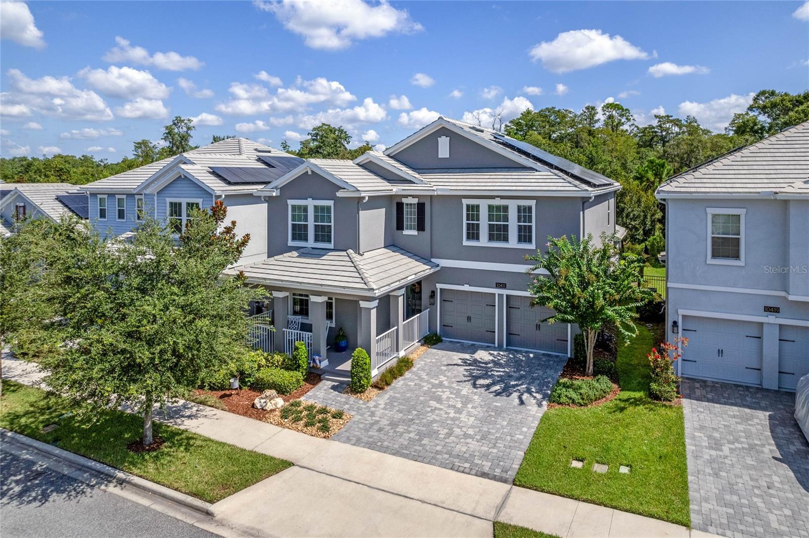 Welcome to this incredible Solar-Powered home that is nothing short of a work of art! Located on the GATED side of Storey Park featuring 5 bedrooms, 3.5 baths, a 3 CAR TANDEM GARAGE with a MAIN FLOOR OWNER'S SUITE and (2) LAUNDRY ROOMS - this one is like no other home in the community! Boasting a Slate Tile Roof with a spacious Front Porch and Screened Lanai for peaceful CONSERVATION Views. Prepare to be awed by the completely remodeled Owner’s Bath Suite and Powder Bathroom that emanate COMFORTABLE LUXURIES. The Owner’s Suite features Luxury Vinyl Plank flooring and a huge Walk-In Closet with Custom Built-Ins. And the bathroom has been completely redone with a freestanding tub, new cabinets, mirrors, wall tile - this room feels like a high end hotel bath suite! In the Living Room, you'll find a Custom TV Wall enclosing an ELECTRIC FIREPLACE that enhances the relaxing ambiance of the space, allowing you to soak in the tranquility that surrounds you with backyard nature views framed by a wall of windows. Upstairs, a 546 square foot LOFT AREA welcomes you, providing an ideal space for a movie or game room. The (4) Secondary Bedrooms are generously sized, each measuring at least 13x14 feet and offering either a Walk-in Closet or a Double Closet. The two full upstairs bathrooms come complete with double sinks in each and feature doors that separate the shower area for added privacy. Equipped with a Whole Home Water Filtration System, Rain Gutters, a Wrought Iron Fence, and a new Water Heater in 2021. The garage has been finished with Epoxy Paint, along with New Exterior and Interior Paint in 2023. HOA dues include high-speed internet, 300 cable channels, and home phone. Storey Park amenities include a resort-style pool, tennis courts, 24-hour fitness center, clubhouse, on-site HOA management, 24-hour roaming security, dog park, playgrounds, and miles of natural trails, providing every luxury amenity you could ask for in a community. This well-maintained home is conveniently located off the 417, with easy connectivity to 528, I4, and just minutes away from everything Lake Nona has to offer! A MUST SEE - Convenience and elegence await! Copy and Paste Video: https://youtu.be/DuS9Ca8RNIY?si=e-_9bHnzoK5qfBhb