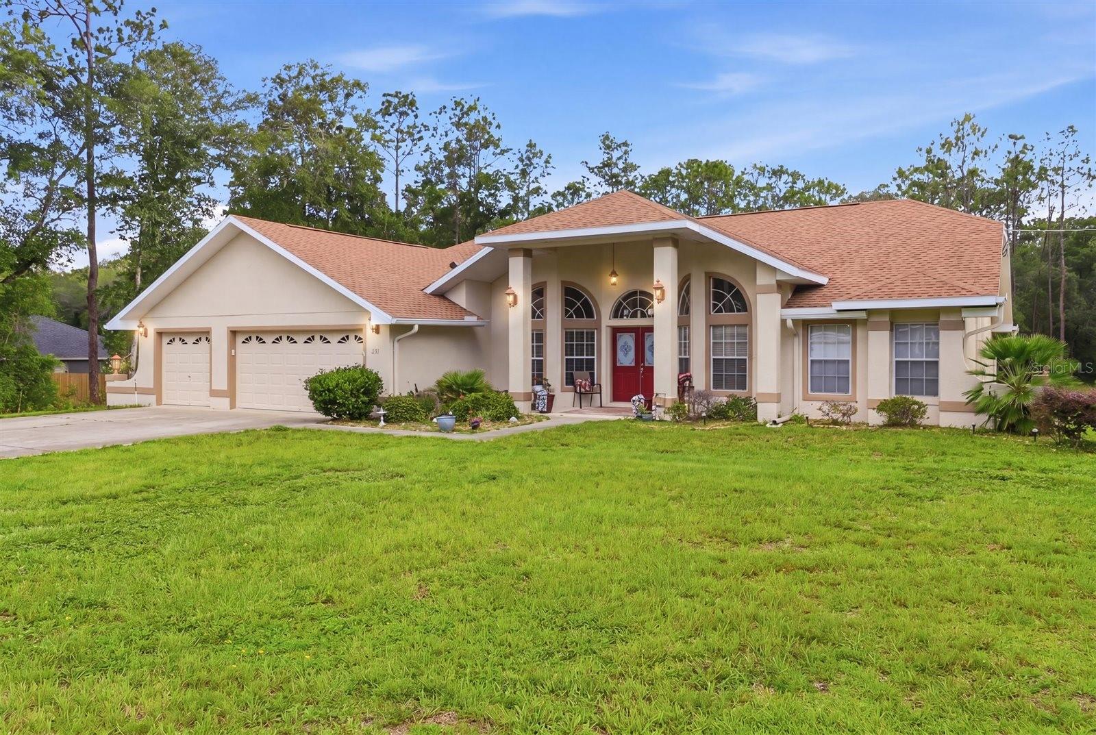 Welcome to Paradise!
A Rare Find in Hernando! From the moment you step inside, you will feel right at home in this bright, open split-floor-plan oasis. 3 bedroom 2 bath home. Nestled on 1.14 acres in the highly sought-after Quail Run community, this property radiates warmth and comfort. The spacious living areas boast soaring vaulted ceilings, four skylights, and striking arched Palladian windows that flood the home with beautiful, natural light. Every detail has been taken care of for you, including gorgeous brand-new luxury vinyl flooring (2026), fresh paint inside and out (2026), and new, remote-controlled ceiling fans in every room
The heart of the home features a cheerful kitchen equipped with brand-new stainless steel appliances (2025), a large pantry, a cozy breakfast nook, and a separate dining area perfect for holiday meals. Whether you work from home or love movie nights, the flexible layout has you covered. Enjoy a dedicated office space plus an additional flex room with elegant pocket glass doors—ideal for a media room, a cozy relaxation retreat, or a potential fourth bedroom
Retreat to the owner's suite, a peaceful haven with its own slider access to the pool, a double vanity, a deep garden tub, and a separate shower. Two additional generously sized bedrooms with plenty of space for family or guests.
Step through any of the four rear openings—including large glass sliders from the living room and owner's suite—into your picturesque outdoor living area. The sparkling pool has been beautifully resurfaced with Diamond Bright and brand-new surround tiles (2026). With breezy ceiling fans overhead on the lanai and tons of seating options, this is the ultimate spot for hosting weekend barbecues or enjoying quiet morning coffee overlooking your private backyard paradise.
Peace of Mind & Perfect Location:
Move-In Ready: Brand-new roof (2023), resurfaced pool (2026), and updated flooring/paint (2026) mean you can just unpack and relax.
Ample Storage: A spacious 3-car garage offers plenty of room for vehicles and toys, plus handy attic storage above.
The Best of the Nature Coast: Enjoy true Florida living! Nestled in the hidden gem of Hernando, you are just 20 minutes from the Gulf of Mexico and moments from the beautiful lakes of Crystal River, Inverness, and Lecanto. Plus, easy access to Route 200 makes commuting to Ocala a breeze.
