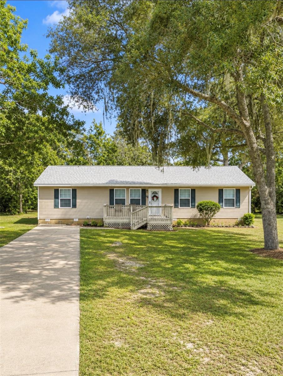 Beautifully remodeled 4-bedroom, 2-bath manufactured home. This move-in-ready home features updated finishes throughout, along with elegant crown molding and chair rail details that add charm and character. Enjoy the spacious built rear deck overlooking scenic views in a peaceful, private setting. Well maintained and in optimum condition, this home offers comfort, style, and a serene retreat you'll love coming home to.