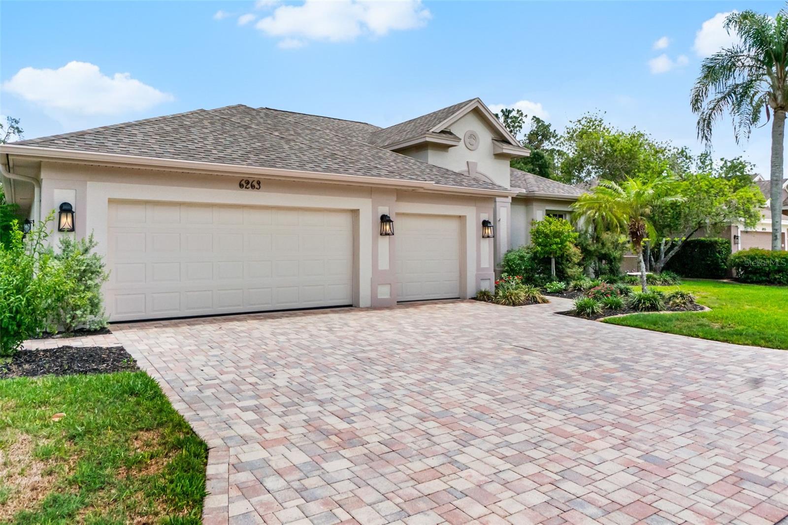 Located behind the gates of the highly sought-after East Lake community, this beautifully maintained Arthur Rutenberg built home seamlessly blends timeless comfort, thoughtful functionality, and the best of Florida living. Featuring 4 bedrooms, 3 bathrooms, and a spacious open-concept floor plan, the home is designed for both effortless entertaining and everyday living. Surrounded by mature landscaping, the outdoor setting feels like a private retreat, complete with a sparkling pool, and screened front and rear porches. An irrigation well provides added convenience in maintaining the lush landscape year-round. Recent improvements to the home include a newer roof and a beautifully renovated primary bath. The flexible fourth bedroom can function as a private en-suite guest retreat, complete with a pocket privacy door and convenient access to the adjacent pool bathroom. Generous storage throughout further enhances the home's thoughtful design. Ideally located just east of I-75 off of Clark Road, this home has convenient access to Proctor Road, shopping, dining, and Sarasota's renowned Gulf Coast.