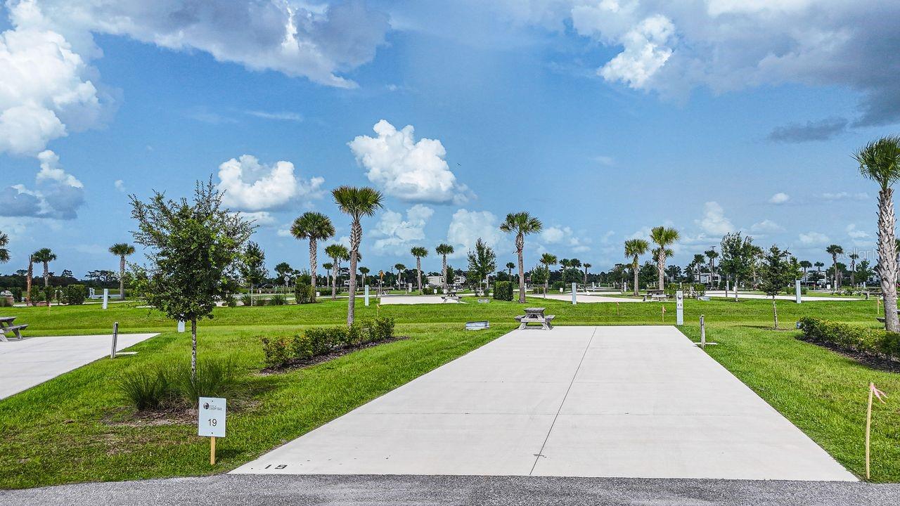 Lot 19 is a rare pie-shaped lot offering exceptional space and flexibility — perfect for creating your dream outdoor kitchen, tiki hut, expanded patio, or customized landscaping. Bring your RV or design the ideal tiny home retreat tailored to your lifestyle.

Ownership includes deeded property within Resort at Canopy Oaks, a professionally managed, gated luxury RV and tiny home community in Central Florida. This highly sought-after resort offers strong seasonal demand and excellent rental potential, making it ideal for both personal enjoyment and investment.

Enjoy resort-style amenities including a beautiful clubhouse, heated pool and spa, fully equipped fitness center, pickleball courts, a dedicated dog park, and an active social calendar — all within a meticulously maintained and professionally managed setting designed for comfort, connection, and long-term value.

Ask about current developer incentives!

Schedule your private tour today and secure your place in this premier Florida resort community.