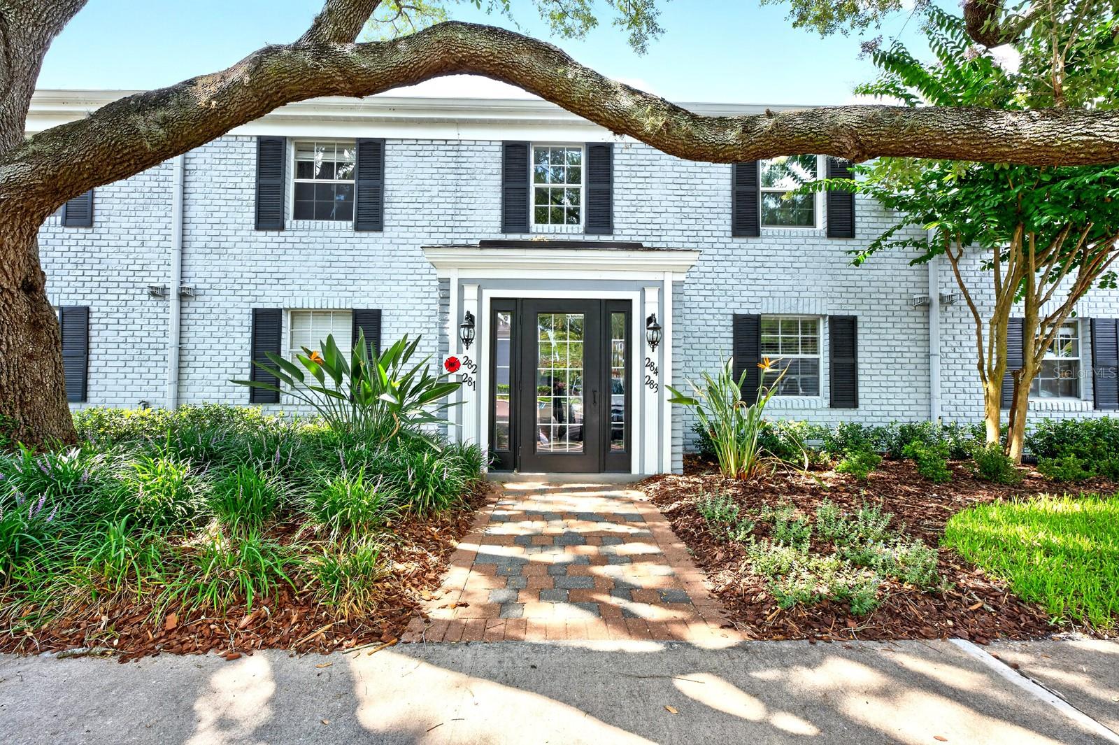 Seller may consider buyer concessions if made in an offer ~ Recently UPDATED and ready for its next owner, this light-filled FIRST FLOOR condo unit offers LOW MAINTENANCE LIVING in the desirable Stratford community of Winter Park – with a monthly HOA that's lower than many comparable communities! Step inside through the semi-private INTERIOR ENTRY to an OPEN CONCEPT floor plan featuring updated bathroom finishes, WOOD LAMINATE & TILE FLOORING throughout, and a spacious living and dining area designed for everyday comfort and easy entertaining. The kitchen is equipped with STAINLESS STEEL APPLIANCES, breakfast bar seating, and a seamless connection to the main living spaces. A convenient IN-UNIT LAUNDRY closet adds to the home's functionality, while sliding glass doors lead out to a SCREENED LANAI overlooking a large green space for the perfect spot to enjoy your morning coffee or unwind at the end of the day. Stratford is a beautifully maintained community offering a park-like setting complete with a COMMUNITY POOL and peaceful surroundings thanks to the mature trees, making it easy to enjoy the Florida lifestyle without the upkeep of a single-family home. Ideally located at the corner of Lake Howell Road and Howell Branch Road with quick access to SR 436, you will appreciate being just minutes from abundant shopping, dining, medical services, parks, and everyday conveniences. Whether you are searching for your first home, a seasonal retreat, or an investment opportunity, this well-maintained Winter Park condo is one you won't want to miss. Call today to schedule a tour!
