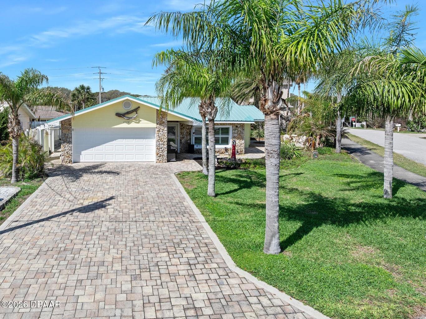 Beachside turn-key home in Light House Shores. Beautiful 3 Bedroom 2 Bath split plan, with a 2 car Garage and oversized RV/Boat parking. This home has been remodeled inside & out, making it move in ready for a full time or part time buyer. The Beach is at the end of the street, allowing you easy access for your mornings runs, and bicycle rides to restaurants & the lighthouse. With a corner lot, on a quiet street, it gives the new owners space to spread out and room for parking all your toys! Also a beautiful fire pit in the gorgeous landscaped yard, perfect for entertaining family and Friends. A Beachside home ready for living the beach dream!
