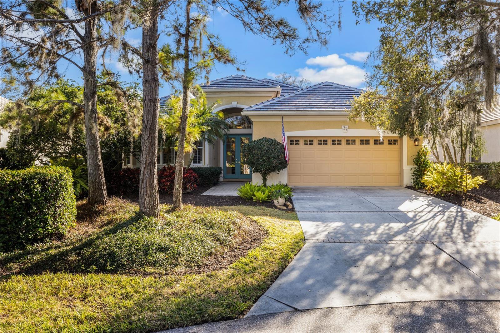 BRAND NEW ROOF 2024! This beautiful 3 bed/2ba home is located in BISHOPS COURT in the Oaks Preserve. Once through the 24 hour guarded security gate you will be treated to rich fauna, streets lined with canopy trees, nature and tranquility. This is a MAINTENANCE FREE community, with its own private pool and clubhouse for only the Bishops Court residents to enjoy . The home was designed and built by the highly regarded Lee Wetherington. As soon as you enter the front door your eyes are drawn to the beautiful view of the Preserve that the home backs up to giving you a private oasis for which to enjoy. The architectural details of the home are not to be missed with 14ft trey ceilings making the open plan living area seem vast. The master bedroom is a spacious retreat with his and her walk in closets and a bonus area for an office/library or work out space. The master bath is light bright and airy, with a beautiful separate oversized soaking tub to relax in. The floor plan offers room and privacy for the home owner and their guests with the 2 other bedrooms sharing a bathroom on the other side. The attention to detail is shown with many upgrades, plantation shutters, pull out shelving throughout the home, brand new appliances, gas stove and updates throughout. It is move in ready.
The Oaks Club is Sarasota's finest Golf and Country Club with numerous accolades. The amenities include 2 world class golf courses 12 Har Tru tennis courts, Croquet Well Fit Center, 4 Pickleball Courts, heated Junior Olympic sized pool. A brand new Grill room is almost completed and The Tavern and Blue Heron room offer fine dining in the evenings. There is an abundance of Clubs and Social activities something for everyone. The Oaks Club is a Platinum Club of America, Emerald Club of the World and Elite Distinguished Club of the World.
You will live minutes from the Legacy Bike Trail, a short drive to the beautiful sandy beach on Siesta Key. Oscar Scherer State Park is just around the corner, cultural downtown Sarasota is 20 minutes away, not to mention all the other activities that Gulf Coast living has to offer.
CLUB MEMBERSHIP IS AVAILABLE AND IS REQUIRED WITH PURCHASE. Paradise awaits. Bedroom Closet Type: Walk-in Closet (Primary Bedroom).