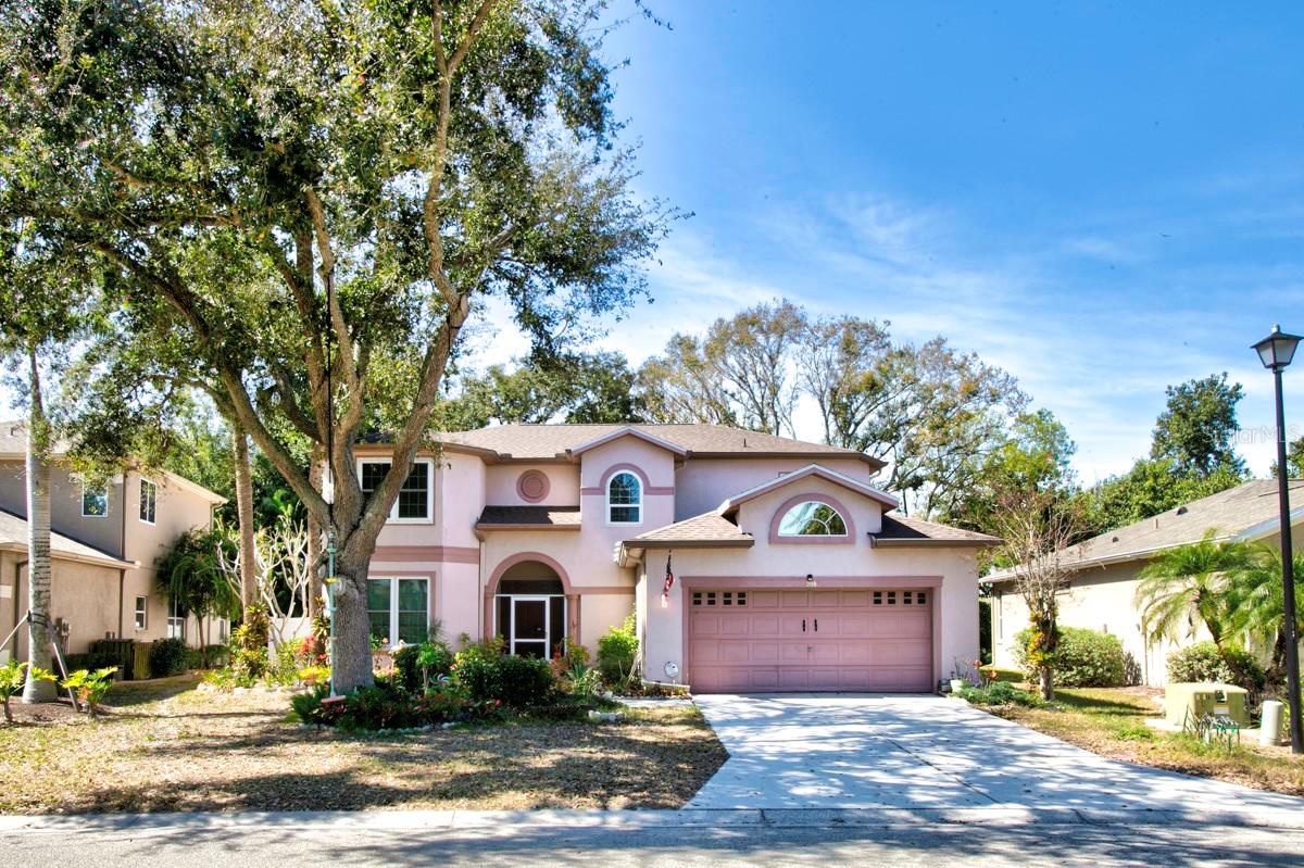 BACK ON MARKET!  Beautiful two-story 5 bedroom, 3.1 bath home, located in the waterfront community of River Point.  Upgrades galore, including new roof in 2022, new hurricane impact windows, designer laminate and tile flooring throughout, new AC in 2024, whole house water filtration system, reverse osmosis, newer bathroom fixtures, including bidets in each bathroom, oversized enclosed lanai installed in 2025, newer water heater, and much, much more!  Close to schools, shopping and churches,