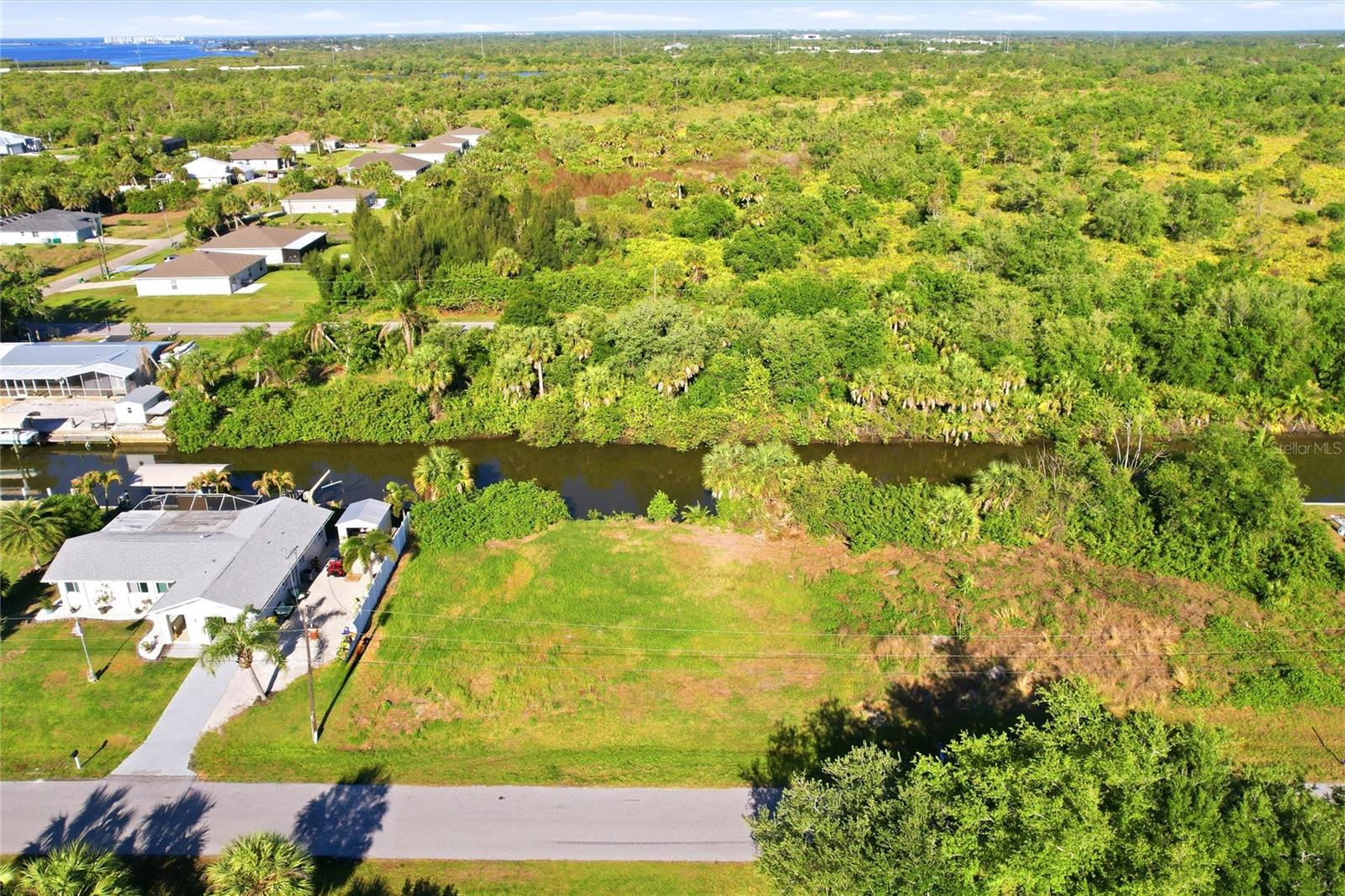 DIRECT GULF ACCESS! Build your Florida waterfront dream on this exceptional oversized homesite located at 3383 Desoto Drive in Punta Gorda! Spanning nearly 1/4 acre, this prime property sits on a saltwater canal leading to the Peace River and Charlotte Harbor, and direct, unobstructed access out to the Gulf—a true boater’s paradise with no bridges to slow you down. Enjoy the freedom to design your custom home with plenty of space for a large residence, pool, outdoor living area, and more—all while taking in serene water views and Florida’s spectacular sunsets. Whether you're an avid angler, weekend cruiser, or simply love the waterfront lifestyle, this lot delivers the ultimate coastal experience right from your backyard. Minutes from Harbor Heights Park which offers a public boat ramp, picnic areas, playgrounds, tennis courts, and a serene riverside setting for relaxation and recreation. Harbor Heights is a quiet community conveniently located near shopping, dining, golf courses, and the charming historic district of Punta Gorda, you’ll have the perfect balance of tranquility and accessibility. Don’t miss this rare opportunity to own a premium Gulf-access lot and start living the waterfront lifestyle you’ve been dreaming of!