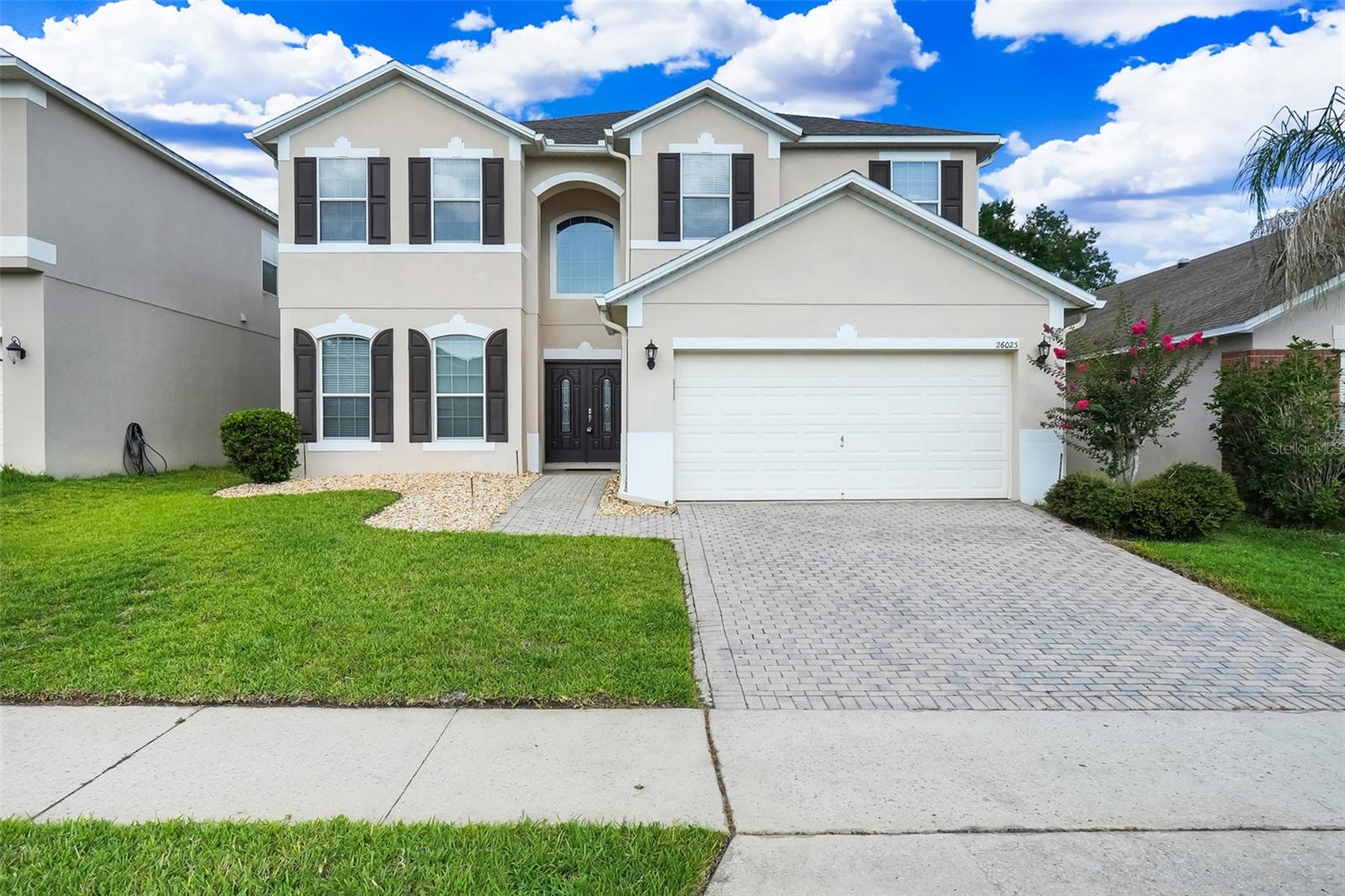Massive Home. Massive Value. Endless Possibilities.
Designed with space and functionality in mind, this expansive two-story home is the perfect fit for a growing or multi-generational family. Offering 4 full bathrooms, a dedicated first-floor office, a spacious family room, and an inviting eat-in kitchen nook, there's room for everyone to live, work, and gather comfortably.
Upstairs, the oversized loft provides the ideal setting for movie nights, game days, or a playroom—creating a flexible space that can adapt to your family's needs.
Step outside to an enormous screen-enclosed concrete patio, large enough for a basketball hoop, play area, outdoor entertaining, or even a family-sized hot tub. The fully vinyl-fenced backyard offers privacy and a secure space for pets and little ones to play.

Additional highlights include:
Roof replaced in 2020
Dual HVAC systems updated in 2023
Newer appliances
Convenient indoor laundry room
Ideally located with easy access to the Orlando International Airport, world-famous theme parks and attractions, shopping, dining, and everyday conveniences, this home delivers the practical Florida lifestyle you've been searching for.
Don't miss this incredible opportunity to own an enormous home at an exceptional value—schedule your showing today!