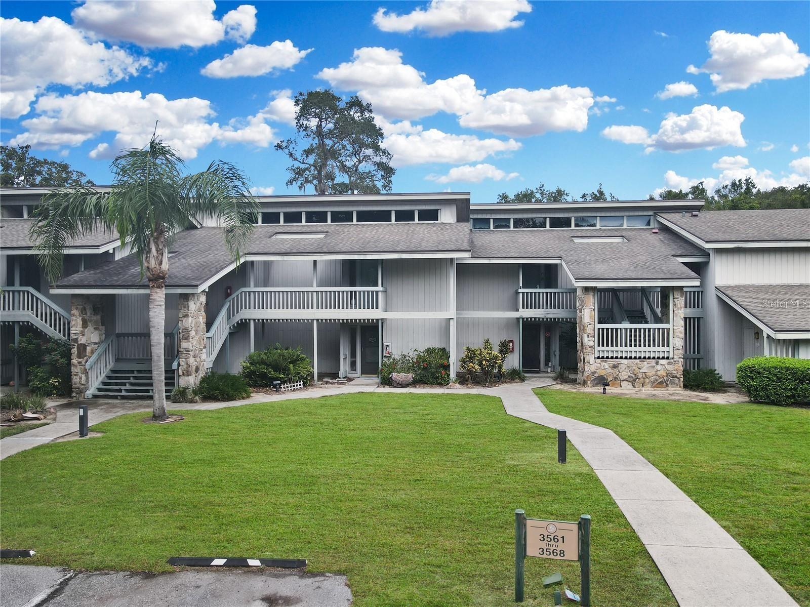 Prime Opportunity in Grenelefe! Set in a beautiful community with mature landscaping and winding roads, Grenelefe offers a private and peaceful lifestyle that feels tucked away yet remains convenient to everything. This rare second-floor condo with vaulted ceilings combines charm with income potential, making it ideal for both owner-occupants and investors. Inside, you’ll find two spacious bedrooms, with the primary suite featuring an en-suite bathroom, its own private entrance, and an independent air conditioning unit with thermostat. This setup allows you to live comfortably in one space while renting the other, or lease both for dual income streams. Whether you’re seeking a comfortable home with built-in rental flexibility or a strong long-term investment, this property delivers both lifestyle appeal and consistent demand. Don’t miss the chance to secure this unique asset today!