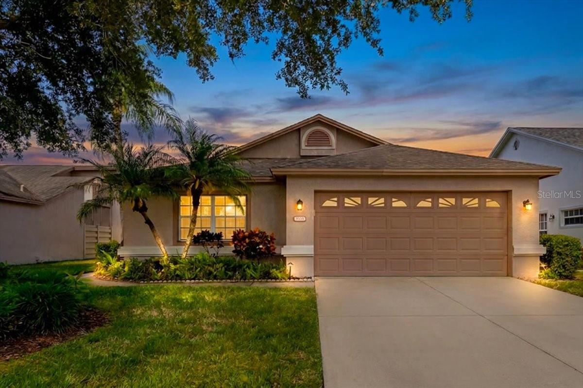 Must See!  This spacious, open-concept home stands out with more square footage than nearby properties and upgrades where it counts.  Featuring an updated kitchen, beautifully remodeled bathrooms, and a custom master closet, this home is designed for both comfort and style.  Enjoy the added bonus of a sunroom/bonus room, and private patio - perfect for entertaining or relaxing.  New roof 2025 and A/C 2021 make this home the worry free choice!
