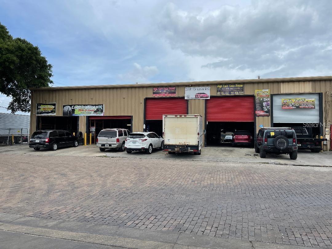 Prime Commercial Turnkey Opportunity near Downtown Orlando! You can own both the real estate and a fully operational automotive business. This versatile 8,160 SqFt facility sits on a spacious 0.67-acre lot in a busy area. It has 7 drive-in doors, 5 large bays, and 7 lifts. The property is designed to operate four different businesses: a Full-Service Mechanic Shop, a Tire Shop, a Licensed Car Dealership, and an Auto Body Paint Shop.

Take advantage of the **Grandfathered Auto Body Paint Shop status**, which is hard and costly to get under today’s environmental rules. The sale includes the real estate, the business, and all the machinery, tools, and equipment. It’s a ready-made investment that brings in income! Don't miss out on this unrepeatable opportunity—schedule your private showing today and act before it's gone!