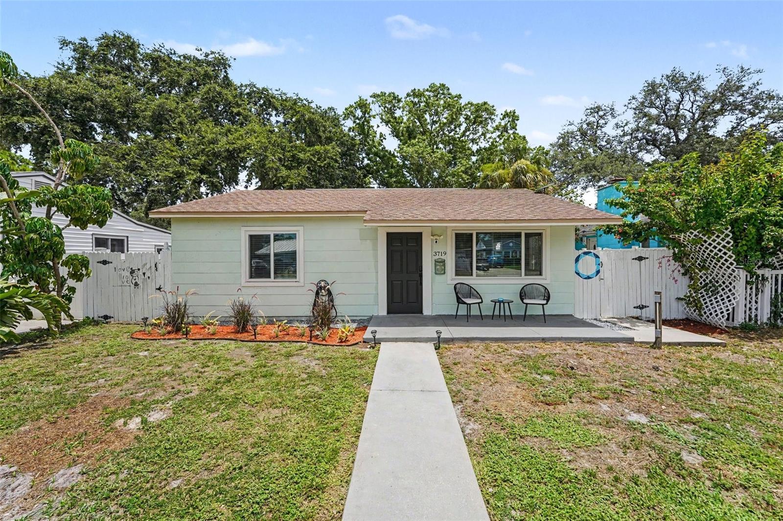 Welcome to this charming Disston Heights gem! This light and bright 2-bedroom, 1-bathroom home features 800 sq. ft. of comfortable living space, plus a versatile bonus room that makes the perfect home office, den, or nursery. The functional floor plan includes a welcoming living room that transitions smoothly into the dining area and kitchen. Step outside into your private, fully fenced backyard oasis featuring a spacious paver patio ideal for weekend barbecues, a convenient storage shed, and rare rear alley access. Perfectly situated in a non-flood zone, this home places you in the heart of St. Petersburg—just minutes from vibrant downtown St. Pete, the Gulf beaches, local parks, shopping, and dining. Ideal as a primary residence, a winter getaway, or a stellar investment property. Schedule your tour today!