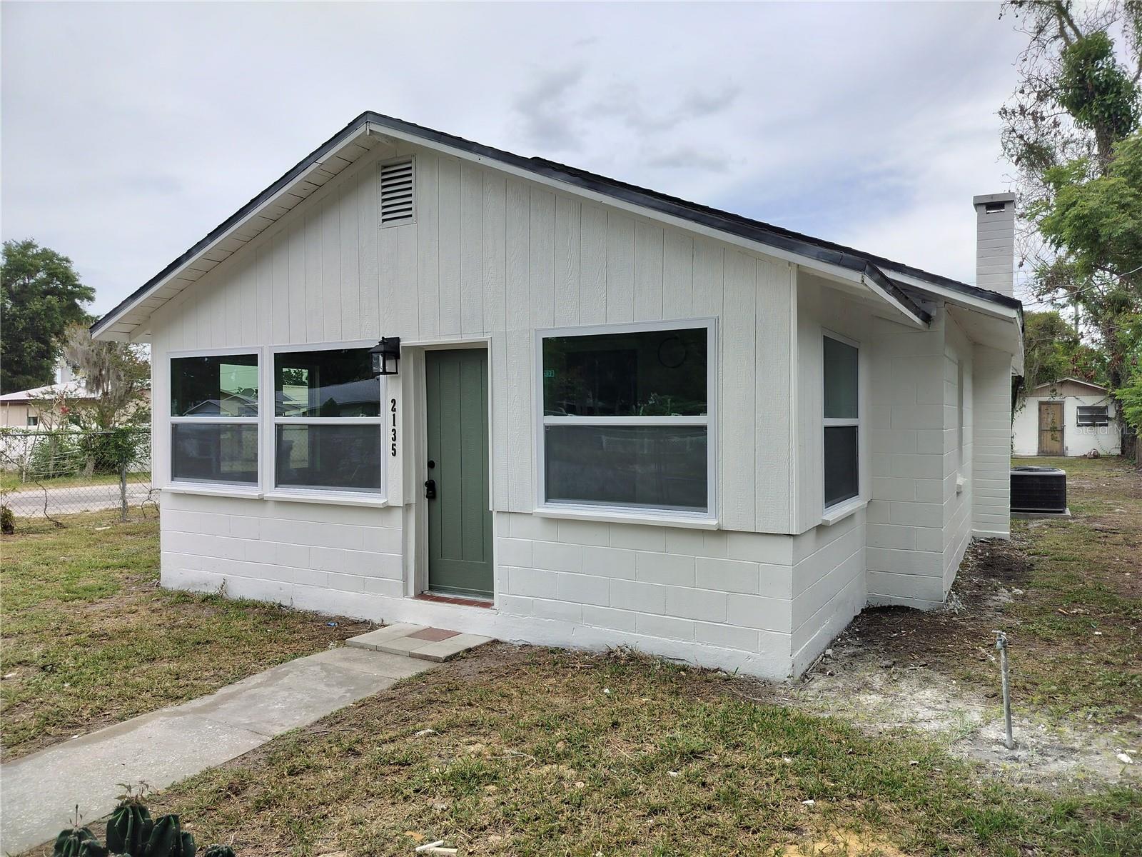 Welcome to the 2 bedroom/1bath home in west Lakeland.  Also a bonus /flex room that could be a sitting room, office, library, etc. New Luxury Vinyl Plank flooring throughout, freshly painted exterior with many updates: 6-panel doors, ceiling fans, fixtures and lighting, New Kitchen and Bath features granite counters/vanities, stainless appliances and new cabinets. Fenced yard and solid carport. ROOF 2022; HVAC 2017