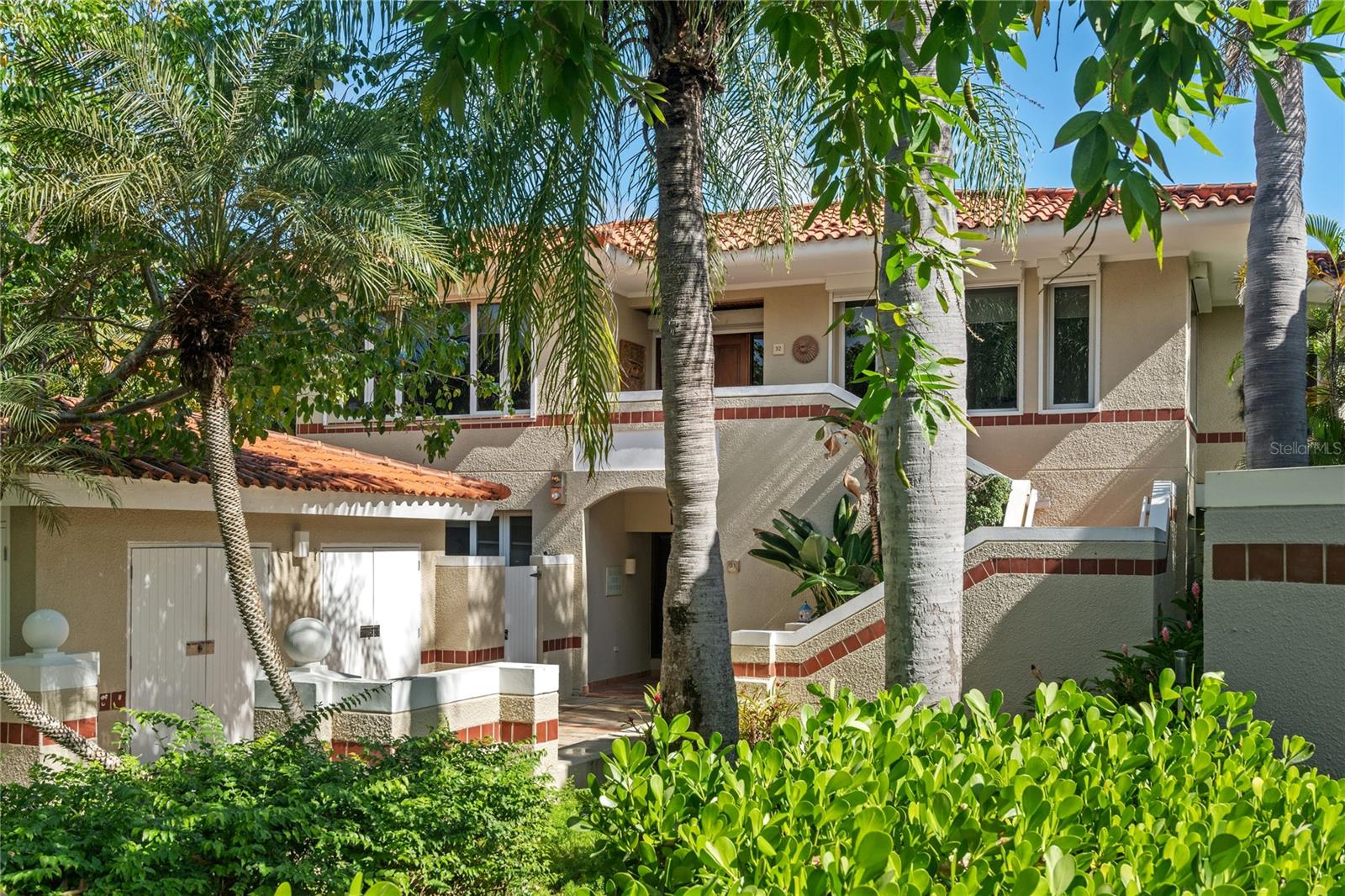 Experience out of the ordinary lifestyle at The Greens located within the esteemed Dorado Beach Resort. This 3-bedroom villa, designed with family vacations in mind, combines the best of both worlds: the serenity of a private home and the excitement of resort living.

?From the moment you step through the stucco, palm-lined entrance, you're greeted with the warmth and elegance that defines The Greens 32. The villa offers a generous layout that sleeps up to 8 guests, featuring a primary bedroom with a 4-poster king bed and tall windows that frame the beautifully landscaped gardens, a second bedroom with two full beds, and a third bedroom with a cozy queen-size bed.

?The heart of the home, a fully equipped kitchen, sits adjacent to a sunlit dining area that overlooks the resort's lush landscape. The living room, with its upholstered, deep-cushion couches, invites relaxation and family gatherings. The outdoor patio, a haven of tranquility, offers breathtaking views of the garden, lake, and ocean, perfect for quiet reflection or entertaining guests.

?The residence includes conveniences such as central air-conditioning across four zones, and a full suite of kitchen appliances. For those seeking adventure, the villa's proximity to Dorado's golden-white beaches, renowned golf courses, and the vibrant town of Dorado places you minutes away from entertainment, dining, and shopping.

Amenities within the gated community include a modern pool, tennis courts, and access to the exclusive Dorado Beach Resort. Here, you can indulge in spa treatments at Spa Botánico, partake in "Goodwinds Water Sports," or join the "Ambassador of the Environment Program" for families.

The Greens is more than just a residence; it's a gateway to a lifestyle of comfort, adventure and endless possibilities. Just 35 minutes from the bustling attractions of San Juan, it promises a sanctuary of peace and adventure for your family in the paradise of Dorado Beach Resort.