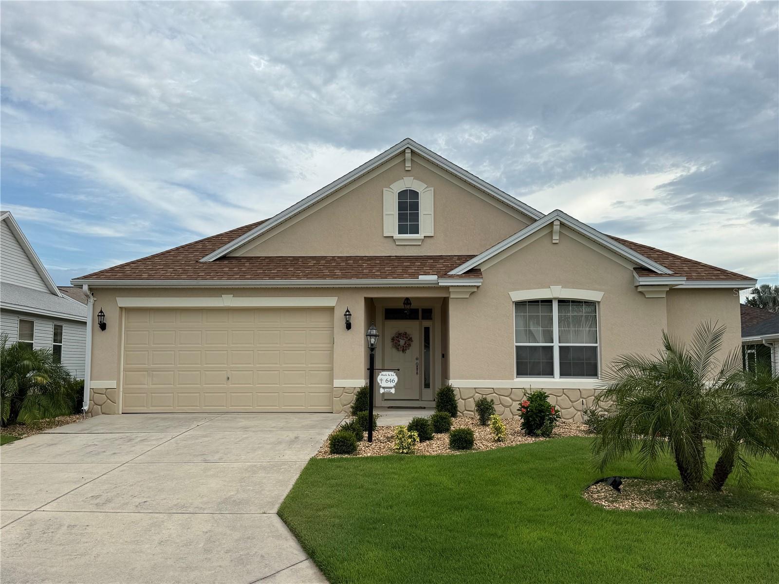 NO BOND~ROOF 2024~WATER HEATER 2025~Stainless Appl. 2026~LVP 2025~ NO CARPET~NEW PAINT~New Garage Door Opener w Cameras~ GREAT LOCATION IN MALLORY SQUARE 1.3 Mi to LAKE SUMTER. Welcome home to this beautifully maintained residence that offers the perfect blend of sophistication and everyday comfort.Step inside to discover an open, light-filled floor plan featuring luxury vinyl plank flooring,SOARING CEILINGS, and elegant PLANTATION SHUTTERS throughout. The spacious formal dining room, highlighted by a stunning crystal chandelier and bay windows, provides the perfect setting for entertaining family and friends.The expansive kitchen is truly the heart of the home, offering abundant cabinetry, generous counter space, a center island, gas cooking, stainless steel appliances, 2 PANTRIES and a bright breakfast nook—ideal for casual mornings or evening gatherings.Retreat to the oversized primary suite featuring beautiful bay windows, luxury vinyl flooring, and plenty of space for a sitting area. The spa-inspired en-suite bath offers dual vanities, a makeup station, an oversized walk-in shower, and an impressive walk-in closet. Bedroom 2 has a WALK_IN CLOSET and Jack & Jill Bath that connects to Bedroom 3- currently used as an office. There’s a half Bath off the Foyer in between the Guest Rooms.The SPACIOUS living room provides plenty of room to relax while overlooking the private rear lanai. Step outside to enjoy your covered screened lanai—an ideal spot for morning coffee, evening cocktails, or simply enjoying Florida’s beautiful weather year-round.PRICED TO SELL! CALL ME!