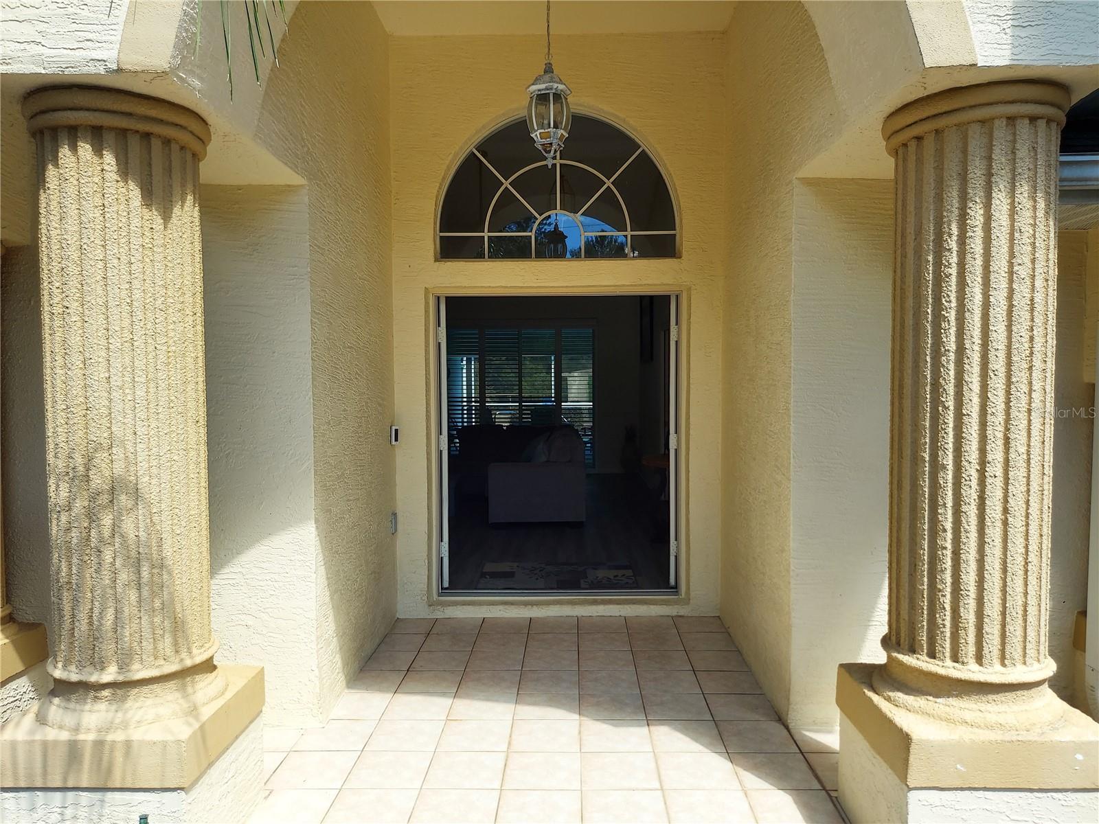 This gorgeous home is located in the Estates of Pine Ridge.  This 3 bedroom, 3 bath, 2 car garage with a 12X24 outdoor pool on a 1.14 acre lot.  Home boasts the following:  2020 new roof, and 2 new skylights with transferrable warranty.  Freshly painted interior and exterior.  New luxury laminate flooring in common areas, tile in wet areas and carpet in bedrooms.  New washer, dryer, refrigerator, range, dishwasher and microwave.  New screen partially installed on lanai. 2019 new air conditioner with transferable warranty.  A 20X30 metal building to store your vehicles and has electric installed. 12 X 24 shed with electric and lighting installed.  An outside fish table with sink to clean your fish.  Plantation shutters on all windows and on the 2 sliding doors as well.  15 zone sprinkler system with fully fenced yard with 2 rolling gates and private road access to the back yard.  A Simply Safe Alarm System throughout the house which includes all doors and windows and 2 keyless entry doors.  All the pvc piping and valves for the pool equipment have been replaced/updated as well as the hi flow pool pump replaced 5 years ago.  fully landscaped property with fruit trees makes the home a lovely place for picnics and family gatherings.  This home is conveniely located to all ammenities within a 10 minute drive. (Walmart, Publix, Winn Dixie and local restaurants).
