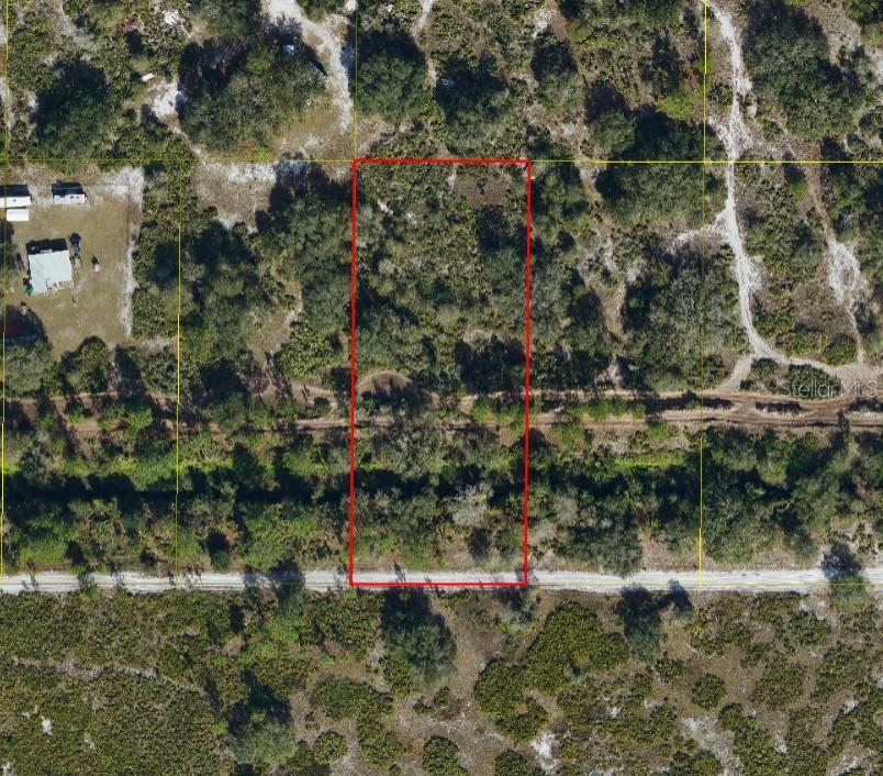 This property is for recreational use only. Owning a lot in Suburban Estates entitles you to a key for the main gate and
entry to Suburban Estates. Suburban Estates covers over 11,000+ acres of land which is known for camping, fourwheeling,
fishing, hunting, etc. This is not a buildable lot. Owner does not have key to gate. Please call agent if you are
not familiar with Suburban Estates. Due to the nature of this type of property, showings are not given by listing agent.
You may use the coordinates provided to view the aerials that are available on Google earth or visit the Osceola County
Property Appraisers website to get an overview of the area.  For those interested, the neighboring lot 5224 003N is also for sale by the same owners at the same price. MLS S5130436