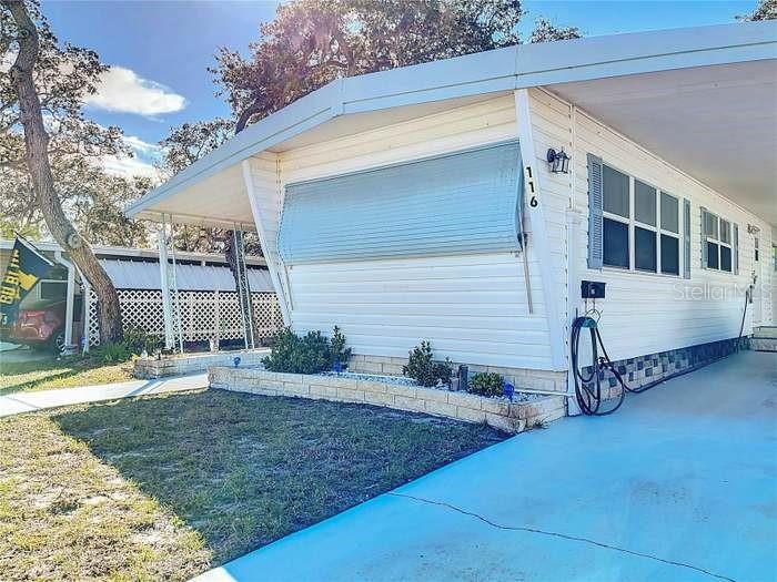 Welcome to this fully furnished, turn-key 1-bedroom, 1-bath manufactured home with a covered carport, located in the highly desirable 55+ co-op community of Country Park in Clearwater.
The monthly HOA fee is just $260 and includes water, sewer, trash, and lawn care. The home is being sold furnished. Furnishings include a couch, chairs, kitchen table and chairs, a bed, and more. The washer and dryer are also included, and a brand-new refrigerator will be installed.

Seller financing is available, offering buyers an additional flexible purchasing option.

Country Park is one of Clearwater’s most sought-after manufactured home communities. Conveniently located on Belleair Road between Belcher Road and U.S. 19, the community offers spacious lots and amenities including a clubhouse with Wi-Fi, a heated swimming pool, laundry facilities, and shuffleboard courts.

The location provides easy access to more than 20 miles of award-winning beaches, golf courses, restaurants, shopping, entertainment, medical facilities, and cultural attractions.