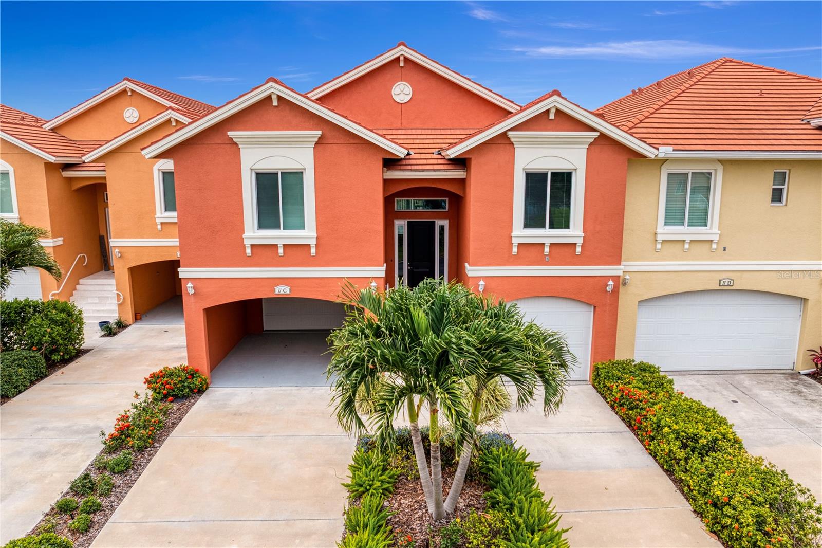Virtually Staged. PRIVATE ELEVATOR AND ALL LIVING ON ONE LEVEL.   Resort style living in a tranquil setting with an abundance of wildlife, yet less then 10 minutes to DTSP or the beach.    There are amazing views of the lagoons from every room and totally private from any other building.      Built to FORTIFIED – Gold standards, which is superior construction that exceeds building code.      This home has luxury updates with natural gas cooktop, open floor plan with beautiful Cambria Quartz counters, Grohe K7 faucet and upper lit cabinets for showcasing your collections.     No detail has been missed with 8' doors and 10’ ceilings, and lots of closet space in all bedrooms.  Primary Suite has 2 walk in closets finished by California Closets and the bathroom you dream of.   Free standing tub and Grohe Euphoria Rain Shower and gorgeous tile.    In the oversized garage, ample for 4 cars plus a carport there is a large wash tub, whether for your dog or cleaning off from the beach, a 22kW GENERAC Natural GAS GENERATOR which powers your whole house, so no power loss anytime.    There is also a very large, screened room overlooking the fountain in the lake.     This home is turn-key, in excellent condition and waiting for its new owner.   The community offers 2 pools, hot tubs, Marina for fishing and docks, club house and fitness center.  Pinellas Trail runs right next to Marina Bay so you can bike the whole county.