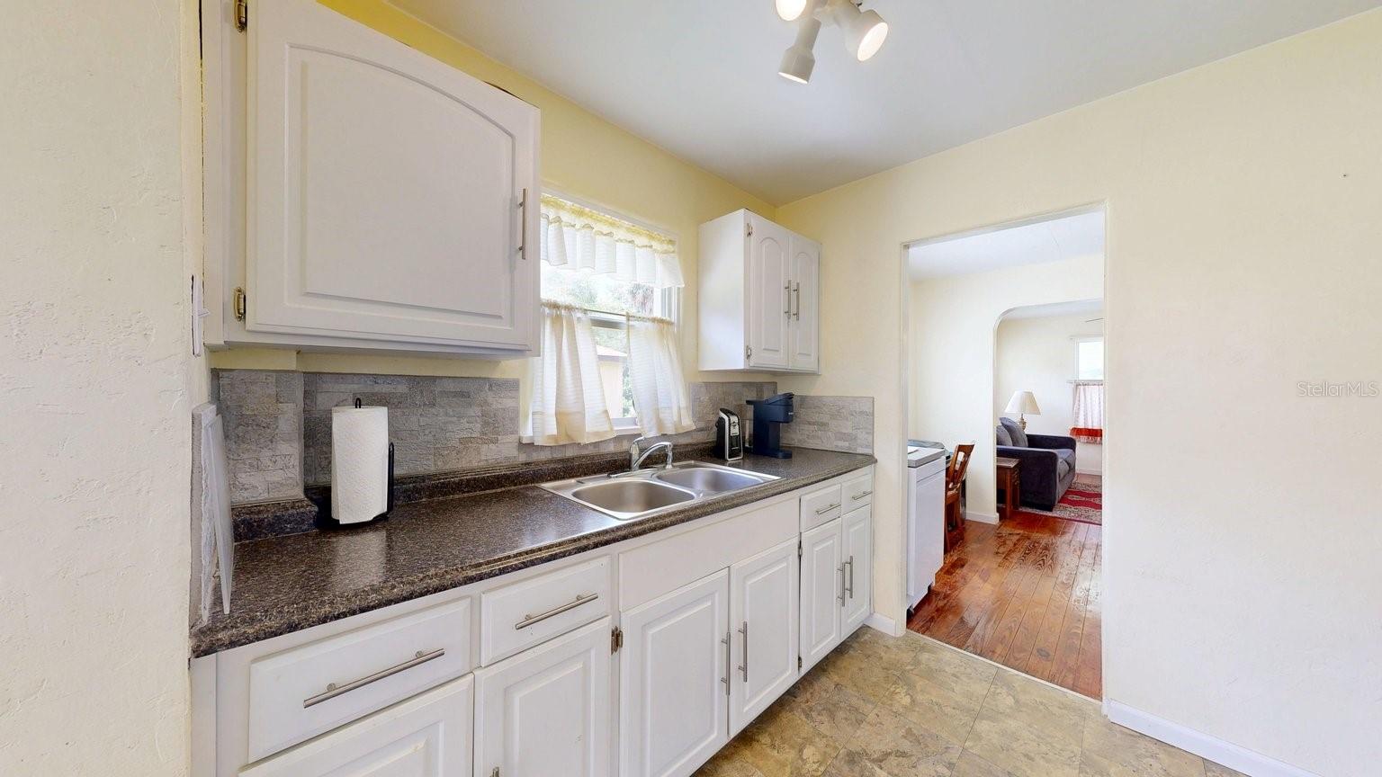RUSSELL E W REP - Residential