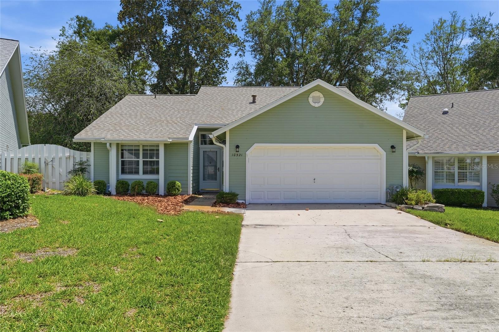 Welcome to the peaceful community of Meadowbrook! This 3 bedroom, 2 bathroom home with a garage has undergone a renovation and is turn key! When you arrive you’ll love the quaint cul-de-sac setting with a beautiful oak tree view and adorable patio homes surrounding. Step inside to soaring cathedral ceilings, warm and durable LVP floors, all new paint, and a calming view of the rolling hills behind the home. To the left of the foyer are the two well appointed guest bedrooms and the fully remodeled guest bathroom. To the right of the foyer is the garage and a spacious entry closet. The foyer opens to the dining and living room with a cathedral ceiling and brick fireplace. The kitchen has been fully remodeled with quartz countertops, stainless steel appliances, ample cabinet storage, a beautiful view of the outdoors. A perfect little sitting area just off the kitchen is surrounded by large windows creating a peaceful spot for morning coffee or whatever your heart desires! On the other side of the living is the perfect owners suite with vaulted ceilings, sliding glass doors, a walk-in closet and a large bathroom that features a fully updated vanity, a walk-in shower, and a large soaking tub with a sunlight position perfectly above it. There’s so much to love about this adorable and welcoming home. Call today to schedule a showing!