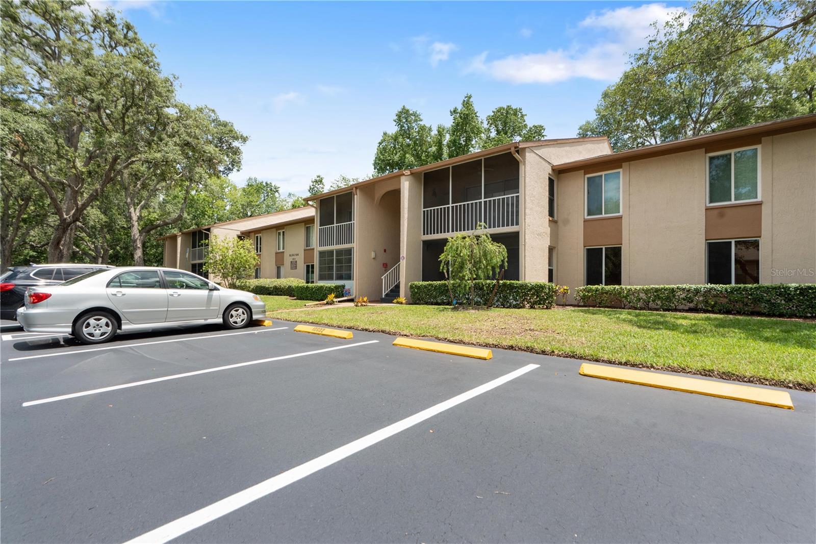 You can live the Florida lifestyle when you own this Fully Updated and Move in Ready ground floor 55 plus condominium. Pine Ridge at Sugar Creek is a gated community that offers a Pool and Tennis courts with beautifully maintained Florida native landscaping. This condominium boasts New Windows throughout the house as well as the screened patio windows. Both Bathrooms have been Updated and the laundry room is inside the condo. The stacked washer and dryer are included with the sale and all of the appliances are newer within the last few years. You will notice that the kitchen has been updated and the pantry cabinet has roll out shelves. There is also an eat in space in the kitchen. One pet is allowed and the buyers approval by the association is required. Room sizes are approximated and association rules are to be verified by the buyer.