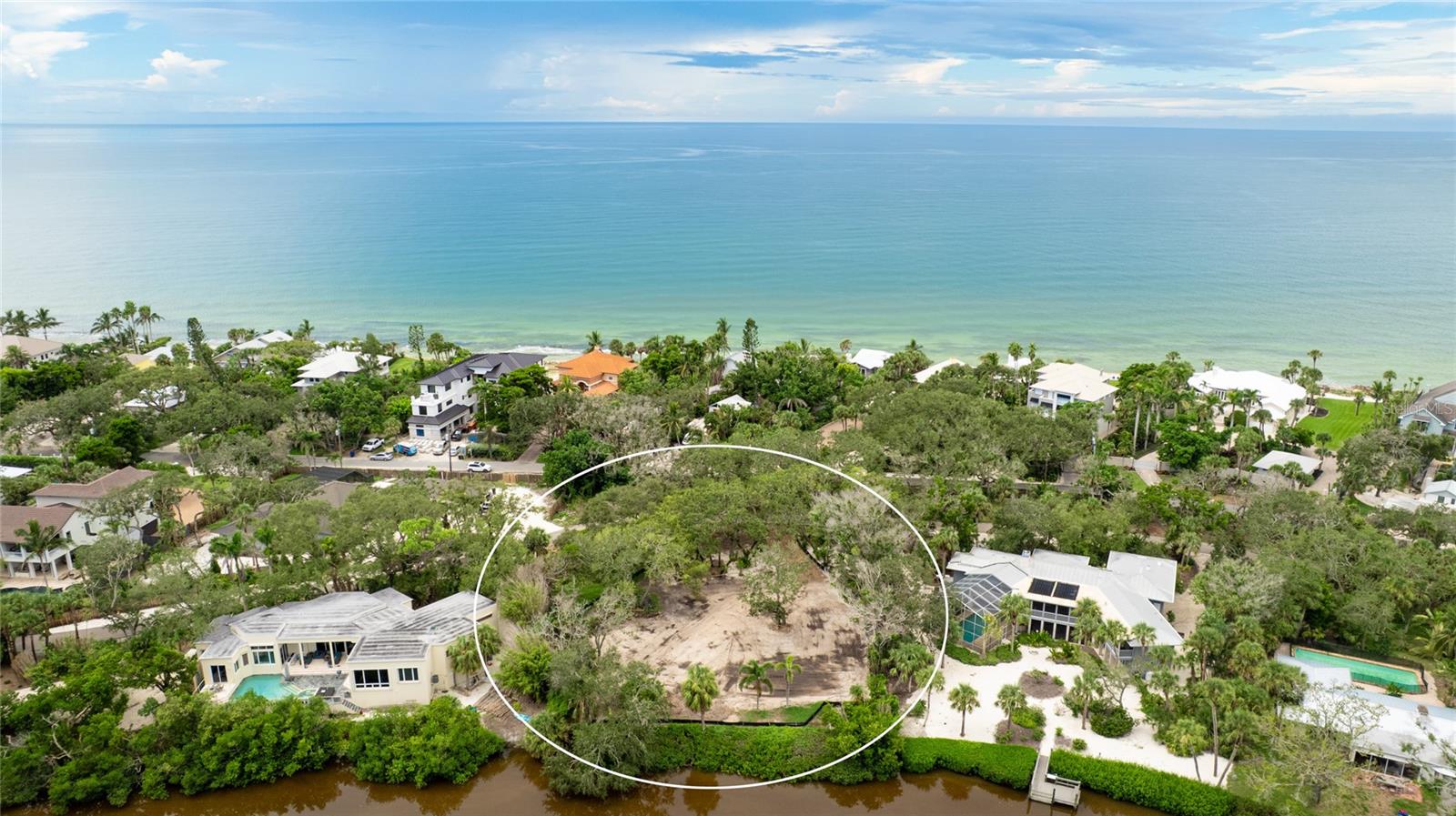 Welcome to an extraordinary opportunity within the Sanderling Club, one of Siesta Key’s most prestigious and renowned gated communities. Nestled along the coveted Gulf of Mexico coastline, this enclave is celebrated for its unrivaled privacy, beautiful natural old Florida lanes, and rare beach-to-bay access giving a lifestyle few communities can offer.This nearly one-acre homesite is truly one of the best opportunities in Sarasota to build an unbelievable estate in a world-class neighborhood. Opportunities of this caliber on Siesta Key are exceptionally rare, making this property a remarkable find for those seeking to create a legacy home. Adding to its value, the property also conveys with 1/9th ownership of a separate lot across the lagoon, providing even more unique benefits and future possibilities.
Life in the Sanderling Club is as rich as it is relaxing. Residents enjoy exclusive access to a private, sugar-sand beach offering some of the most breathtaking sunset views on Siesta Key, along with a bayfront marina providing direct sailboat access to Sarasota Bay, the Intracoastal Waterway, and the Gulf of Mexico. The community fosters year-round activities and social events, all while preserving the timeless charm of an Old Florida setting. Enhancing this lifestyle, residents can look forward to a brand-new private clubhouse currently being designed, future beachside cabanas, and the enjoyment of tennis courts, making the Sanderling Club one of the most desirable and dynamic communities on the island.
Beyond the gates, you’re just minutes from the world-famous quartz sands of Siesta Beach, the charm of the South Siesta Village, the boutiques and dining of the north Siesta Village, and a short drive to downtown Sarasota’s vibrant arts and cultural scene, featuring award-winning restaurants, theaters, ballet, opera, galleries, and museums.
Whether envisioning a modern coastal retreat or a timeless island estate, this homesite offers the perfect canvas in a community where natural beauty, exclusivity, and lifestyle converge.