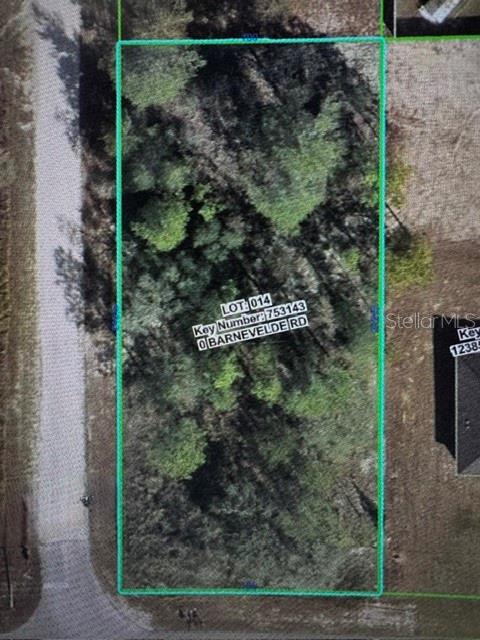 Discover the pristine, high-and-dry half-acre parcel (Lot 14, Block 448) in the highly desirable Royal Highlands community. Situated just north of the intersection at Herschel Road and Barnevelde Road, this lightly wooded corner lot  offers no HOA fees or deed restrictions, allowing you to build a custom single-family home. Nice area rapidly growing pocket of Hernando County featuring brand new residential builds nearby. Power is available along the street; well and septic are required. 
Minutes from the world-famous Weeki Wachee Springs State Park, pristine Gulf coast boat ramps, and extensive hiking trails.
Convenience: Quick access to US-19, Commercial Way, and the Suncoast Parkway for an easy commute south to Tampa
Don't miss your chance to secure an affordable piece of Florida's Nature Coast. View this beautiful, peaceful homesite today!