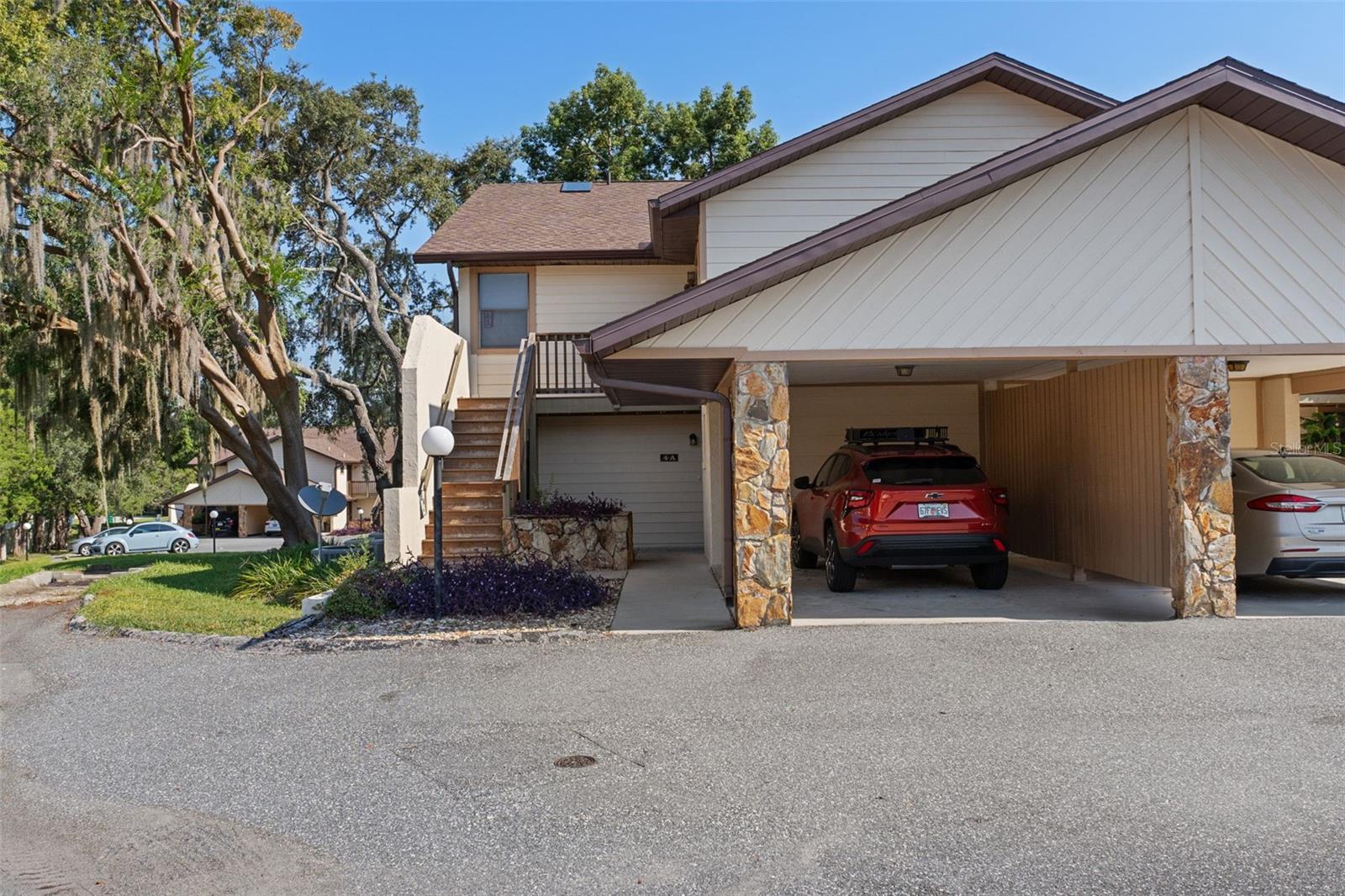 UNBELIEVABLE PRICE MODIFICATION!! Come check out this 1st floor, end unit condo at Greenbrier in Citrus Hills. This unit is completely tiled throughout (with matching tile), has an updated kitchen as well as both baths and a Florida room that will knock your socks off. The Florida room is an extension of your living space with slider doors to a beautifully maintained green space, to add to the serenity of the surroundings. I don't want to forget to mention the huge laundry room off the kitchen. It's so large it can double as a pretty amazing pantry too. This end unit offers more windows than interior units, which adds more natural light to the bedrooms. And the cherry on top of this amazing cake is the roof replacement in 2022 and the HVAC in 2021. This condo is a blank canvas, painted and tiled thoughtfully with all neutral tones that will accommodate any style choice and flare. The condo fee includes internet, water, trash and sewer services, which just adds to the affordability of this home. Imagine living in this desired Citrus Hills community with all the recreation activities and convenience to shopping, entertainment and modern conveniences without any of the yard or exterior maintenance.. sounds like a dream to me. Call me for a tour. I love showing this place off!