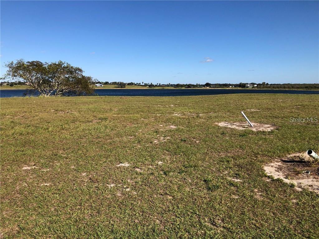 YOU HAVE TO SEE THE VIEWS FROM THIS WATERFRONT LOT! It's about the lifestyle when you decide to move and build in Water Ridge. Whether you like tennis, boating around the lakes, swimming, a workout at the fitness center, or just strolling around this waterfront community, you will never be bored of the tranquility and lake views that homeowners enjoy here. Water Ridge is a gated community, located near the Polk Pkwy and I-4. Less than an hour to both Tampa and Orlando. This is a beautiful waterfront home site in a premium neighborhood, cleared and ready for your dream home to be built! Visit this amazing, gated community today!