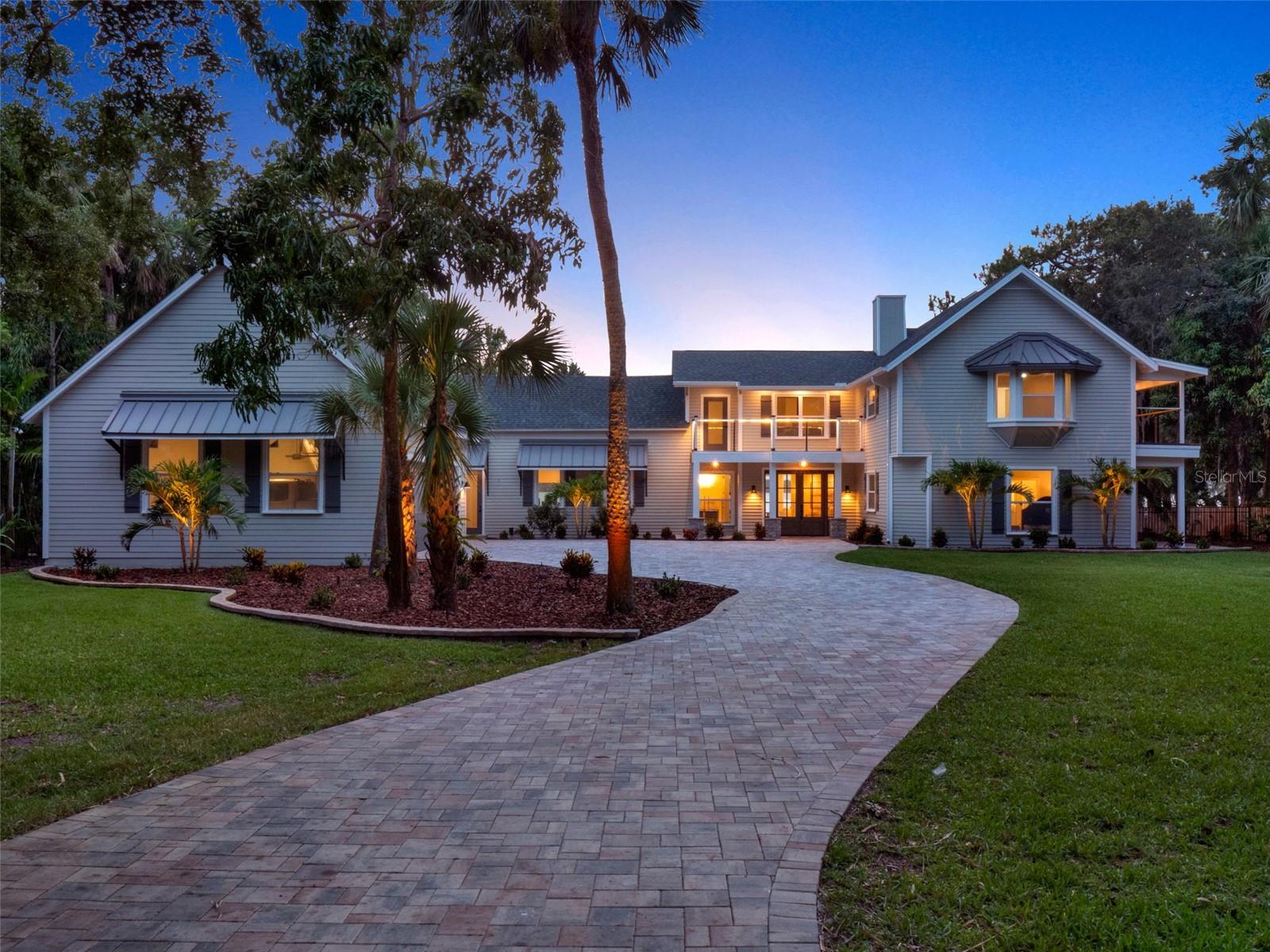 Price Improvement! NOW UNDER APPRAISED VALUE!

Welcome to 3775 S Tropical Trail, a breathtaking waterfront estate on Merritt Island that has been completely transformed through a full-scale modern renovation. No detail was overlooked in revitalizing this iconic property—everything is brand new, including all impact-rated windows and doors, multiple HVAC units, updated electrical panels, spray foam insulation, and dual new hot water heaters.  Inside, enjoy elegant finishes, bespoke lighting throughout, and expansive spaces designed for luxurious living and entertaining. 

The heart of the home is a show-stopping kitchen that perfectly blends luxury, functionality, and design. Featuring all-new soft-close cabinetry, a striking ILVE range with a pot filler, and a custom hood vent that extends to the ceiling, this space was thoughtfully crafted for both everyday living and elevated entertaining. Cabinet lighting highlights the exquisite waterfall quartz countertops and the stylish GE Café appliances, while a dedicated coffee bar and spacious walk-in pantry add convenience and charm. Seamlessly integrated into the family room, dining room, and an impressive glass-enclosed wine room, the layout promotes effortless flow. The wine room itself is a true focal point—complete with floating wine racks, frameless glass walls, custom accent lighting, and built-in refrigeration, it brings a bold statement of sophistication to the home’s open-concept design.

This home offers exceptional functionality with two laundry rooms—one upstairs and one downstairs—for added convenience. The main floor features two spacious guest bedrooms and a private office, ideal for working from home or hosting visitors. Upstairs, the primary suite is a luxurious retreat with a spa-like bathroom, generous sitting area, and breathtaking water and sunset views that elevate everyday living.

A striking new roof and awnings blend architectural shingles with sleek metal accents, while custom pavers now wrap the front entry, backyard, fire-pit and pool area for a seamless outdoor experience. The elevated pool deck creates a true resort-style feel, with built-in fountains that light up at night for a stunning effect. It’s truly a private getaway in your own backyard.

The property also features a newly constructed three-car garage with 12-foot ceilings, ideal for oversized vehicles or storage. A large new patio enhances the outdoor lifestyle, offering stunning water views and tranquil evenings under the stars. This is a rare opportunity to own a truly turnkey modern estate in one of Merritt Island’s most iconic and scenic corridors. This property has 190’ of water frontage with a coquina seawall and a 180’ dock to accommodate a large boat. Contact us today to schedule your private showing!