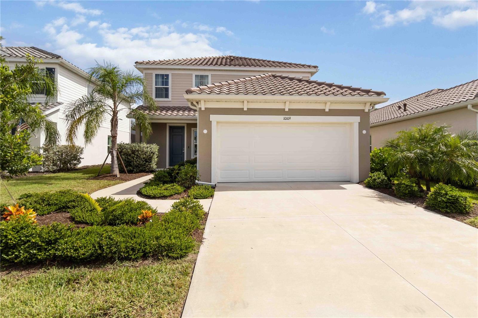 PRICE IMPROVEMENT! Exceptional value in Grand Park. With its attractive new price, this beautifully maintained 2023 home offers the comfort and peace of mind of newer construction, a spacious open-concept design, and immediate move-in availability in one of Sarasota’s most desirable communities.

Offering 2,188 square feet of thoughtfully designed living space, the open-concept floor plan creates a seamless connection between the kitchen, dining, and living areas, making everyday living and entertaining effortless.

The spacious kitchen serves as the heart of the home, featuring a large center island, abundant cabinetry, and direct access to the covered lanai—perfect for morning coffee, outdoor dining, or relaxing after a day at the beach. Natural light fills the home, creating a bright, welcoming atmosphere throughout.

Upstairs, the private primary suite provides a comfortable retreat with generous closet space and an en-suite bath. Two additional bedrooms offer flexibility for family, guests, or a home office, while the conveniently located upstairs laundry room adds everyday practicality. Hurricane shutters and a two-car attached garage provide additional peace of mind.

Residents of Grand Park enjoy an exceptional amenity package, including two resort-style pools, fitness and aerobics centers, tennis and pickleball courts, dog parks, playgrounds, and miles of scenic walking and biking trails. Conveniently located near UTC shopping and dining, championship golf courses, downtown Sarasota, and the area’s world-famous Gulf Coast beaches, this home offers convenient access to everything that makes Sarasota one of Florida’s most desirable places to call home.

With its recent price improvement and move-in-ready condition, this home presents an outstanding opportunity to enjoy the Grand Park lifestyle while taking advantage of exceptional value in today’s market.

Buyer to verify all measurements, information, and community amenities.