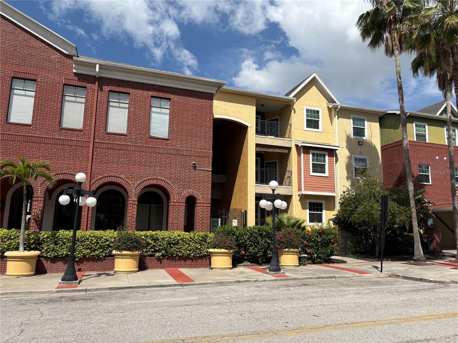 Historic District condo, close enough to all of the action, far enough to enjoy quiet times. This beautiful renovated 2nd floor condo is located next to the office building on 19th Street and Palm Avenue. It has a view of the main pool, comes with two end cap parking spots on the second floor of the parking garage just steps from your front door. Complex offers a workout gym, private theater and party room also includes valet garbage service from your front door.