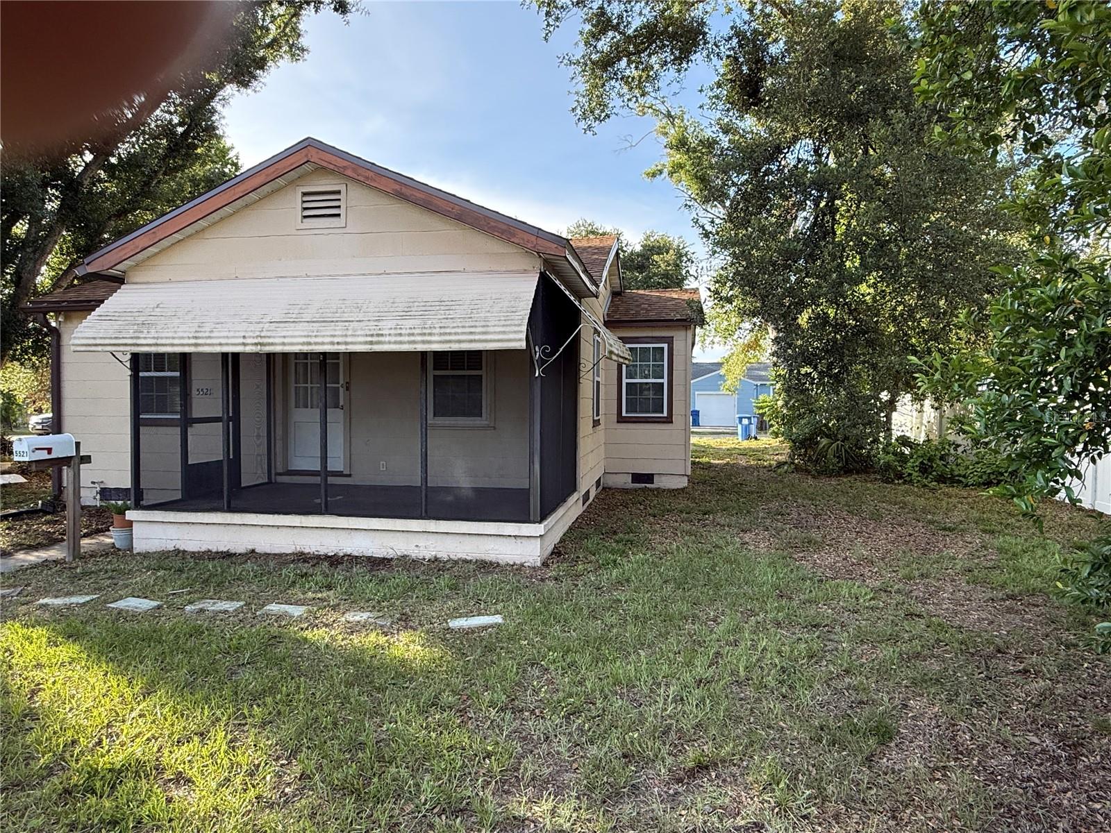 Non-flood area on 5th Ave. bus line. It's a cutie! Beautiful hardwood floors in bedrooms and living room. Updated "Eat in" kitchen w/ Breakfast bar & extra base cabinets. Newer bathroom w/tiled shower and flooring. Front and rear screened and roofed porches. Rear porch has laundry closet Ceiling fans/lights in bedrooms, living room and kitchen area, w/washer/dryer hook ups. 1st month's rent and $2,050 security deposit upfront required to move in.  Credit score of 625+ by at least one tenant. Income should be at least 2.5 times the monthly rent.  Parking off the alley. Utilities are prorated between front & back unit.  On 5th Ave Bus line for easy access to that mode of transportation.  Some trees will be removed in the next few weeks. Rear one bedroom apt. is rented.