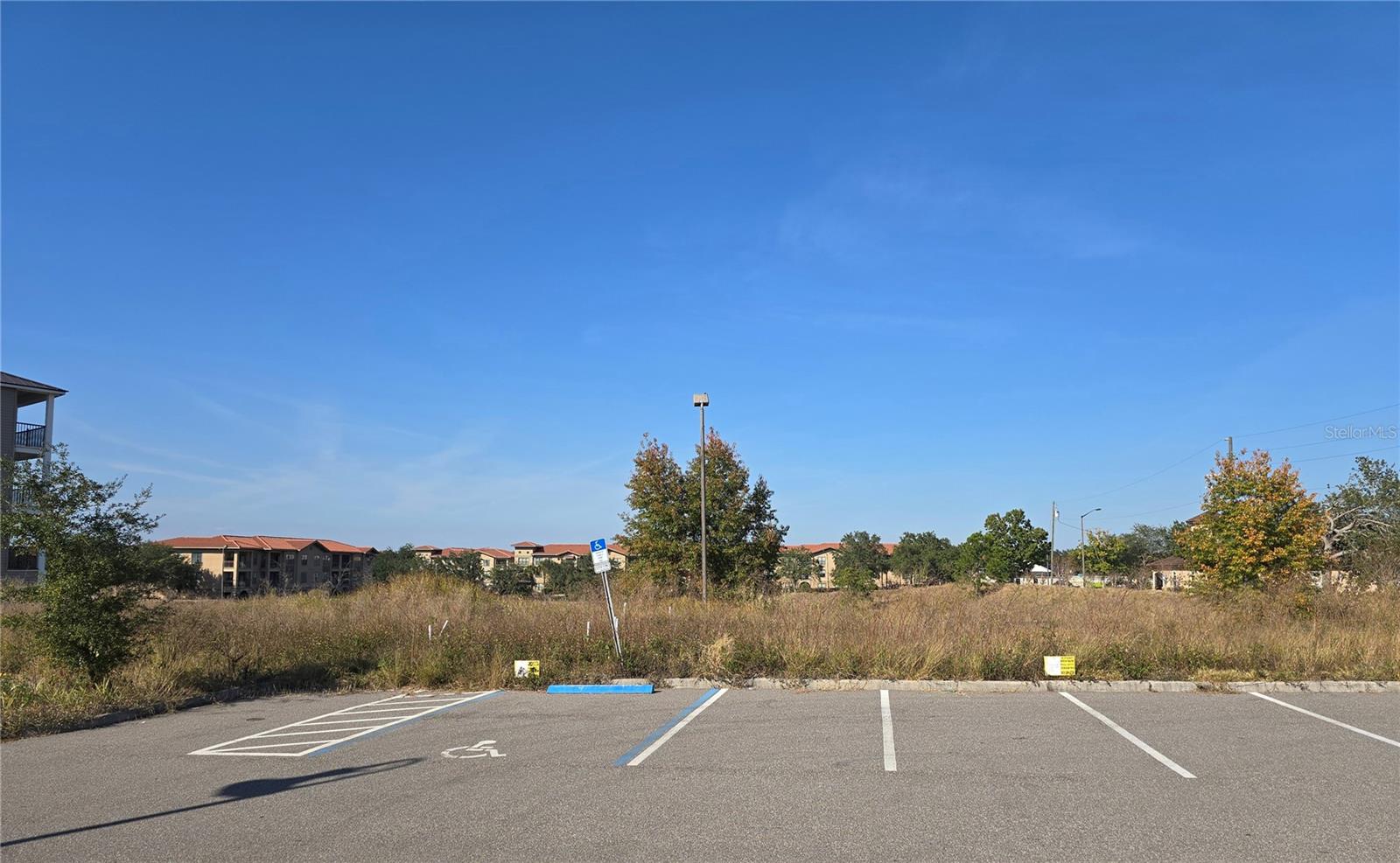 Take advantage of this rare opportunity to acquire a shared ownership of a condo project in the growing area of Four Corners, Davenport. This property offers strong potential for investors seeking a site suitable for future residential condominium construction, subject to county approval and requirements. Zoned Vacation Condo Site Platted, providing a flexible foundation for a variety of development concepts. Its proximity to shopping, dining, entertainment venues, and major roadways makes it an attractive location for a well-planned project. With new construction nearby and utilities in the surrounding area, this project offers a starting point for a builder, investor, or developer looking for a site with long-term growth potential.