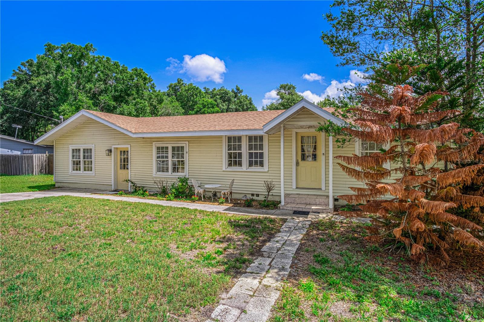 Welcome to your own private slice of Mount Dora! Nestled on an oversized 0.60-acre lot, this charming and updated 2-bedroom, 2-bath home offers peace, privacy, and plenty of room to enjoy the Florida lifestyle. Just minutes from historic downtown Mount Dora and beautiful Lake Dora, you'll love being close to local shops, dining, waterfront parks, and year-round festivals while still enjoying a quiet, tucked-away setting. Roof 2019, A/C 2011, Water Heater 2011