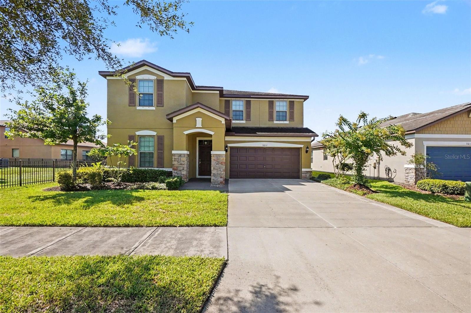 Discover this stunning 5-bedroom, 3-bath home in the highly sought-after gated community
of Magnolia Park, offering exceptional space, flexibility, and modern Florida living. With room
for your entire household, this thoughtfully designed floorplan delivers comfort and convenience
on both levels.
The main floor features an inviting office, elegant formal dining room, spacious great room,
and a chef-inspired kitchen complete with stainless steel appliances, ample cabinetry,
expansive countertops, pantry, breakfast bar with pendant lighting, and a cozy breakfast
nook. Additional highlights include storage under the stairs, a full bedroom, and a full bath—
perfect for guests or multigenerational living.
Upstairs, enjoy a large game room/loft, ideal for entertainment or relaxation. The primary suite
is a true retreat, showcasing a tray ceiling with crown molding, generous sitting area, and a
spa-style bath with dual sinks, garden tub, and separate shower. The second level also
includes an upstairs laundry room, three additional bedrooms, and a full bath with dual
sinks.
Step outside through the sliding doors to a large covered and screened-in lanai, perfect for
year-round outdoor living. Overlooking a peaceful pond, this space includes a built-in cooking
area with sink, cabinetry, and counter space, making it ideal for entertaining. Faux wood
blinds throughout add a polished finishing touch.
All of this within minutes of shopping, dining, entertainment, major highways, and more,
offering unmatched convenience and lifestyle.
Homes offering this level of space, elegance, and resort-style living don’t stay available for
long. Make your move before this one slips away.