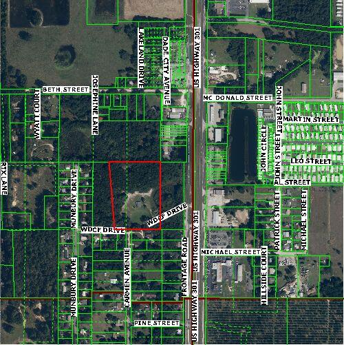 PROPERTY IS ZONED COMMERIAL with the future land use allowing for over 10 units per acre.  Location and access is great for this 10+ acre of land. Located on US Highway 301 in the rapidly growing Dade City corridor. Property has been annexed in to Dade City. Great location for Multi Family or Storage facility. Zoning will be a Mixed Use of Multi Family that allows for up to 10 units per acre and Commercial.  Beautiful property with open areas and Oak trees. Sewer and Water are very close to the site. This will be a dream site for a Developer.  Come join and be a part of the revitalization of Dade City. Many new retail in the area includes Publix (across the street) Dunkin Donuts, Burger King, Raceway, Circle K. Jarrett Fod and Chick Fil A  Additional acreage available.

Currently has a radio station tower which owner can move if needed.

Additional3.8 acres of commercial adjoins the site and can be purchased together or separate