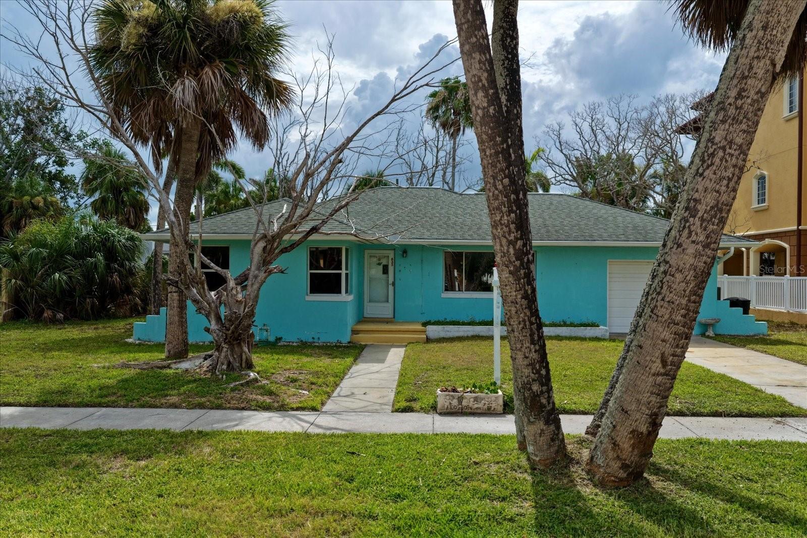 This solidly built 2-bedroom, 1-bath block home offers a spacious living room/family room combination and sits on a generous 0.22-acre lot. Nestled just a few blocks from beach access and only a short distance to the bay, this property is perfectly positioned to enjoy the best of coastal living. While the home experienced flooding, it presents a unique opportunity with endless possibilities for renovation, rebuilding, or creating your dream beach retreat. Whether you're an investor, builder, or buyer with a vision, this property is full of potential. Bring your sandals, imagine the possibilities, and schedule your private showing today!